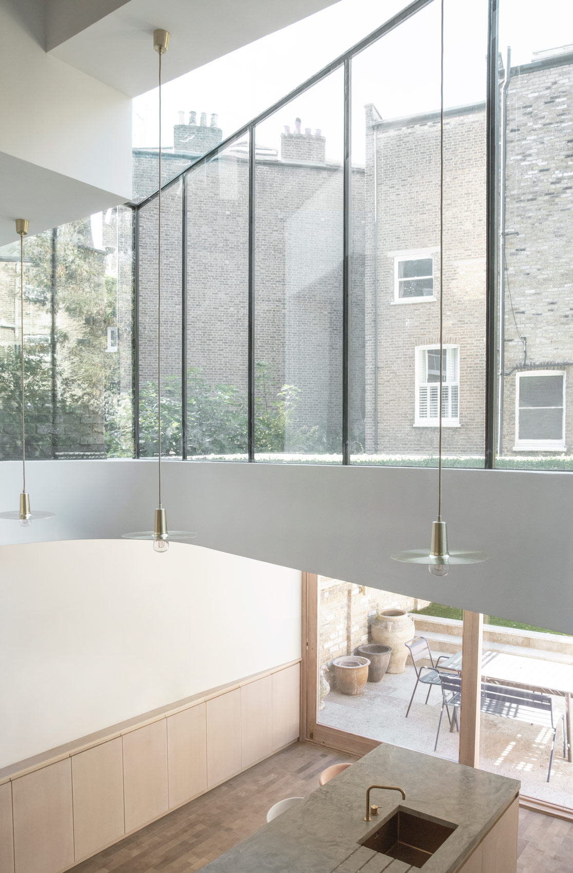 Glass box house extension interior in Hammersmith & Fulham