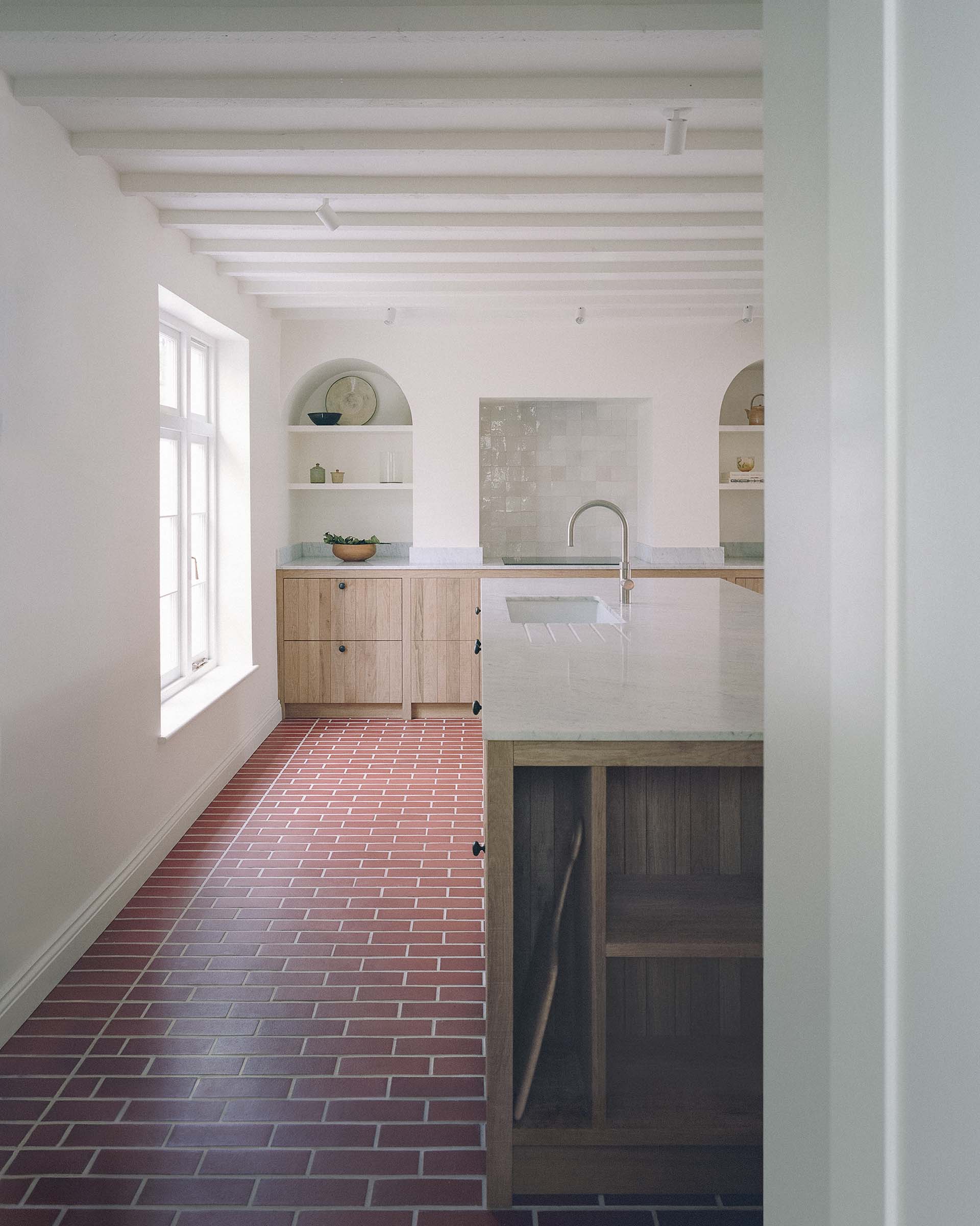 architect designed house in barnsbury islington with marble and oak kitchen and red brick floor