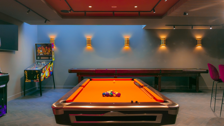 Air conditioning integrated with ceiling coffers in a luxury residential basement in Norfolk