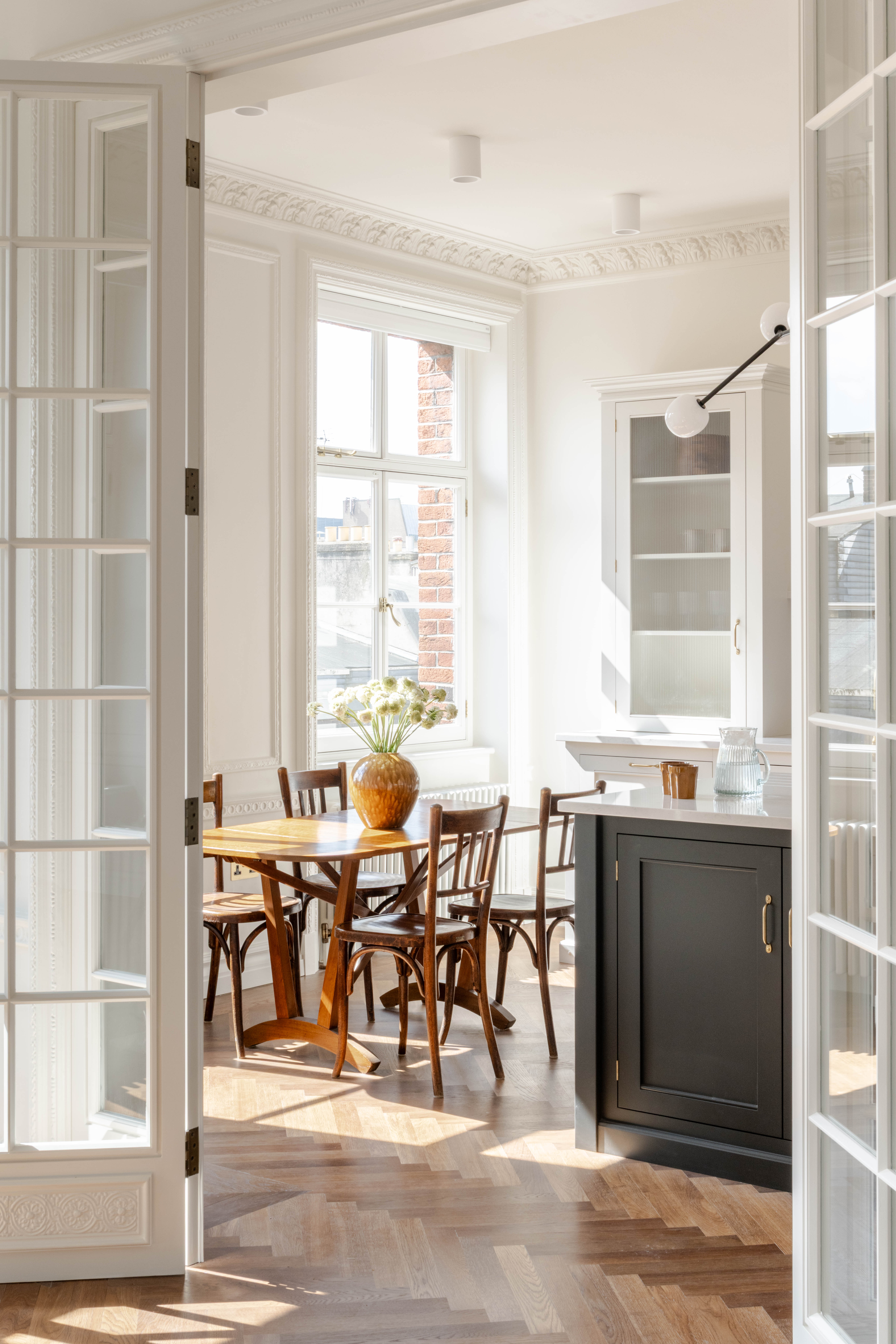 Open doors into Kitchen