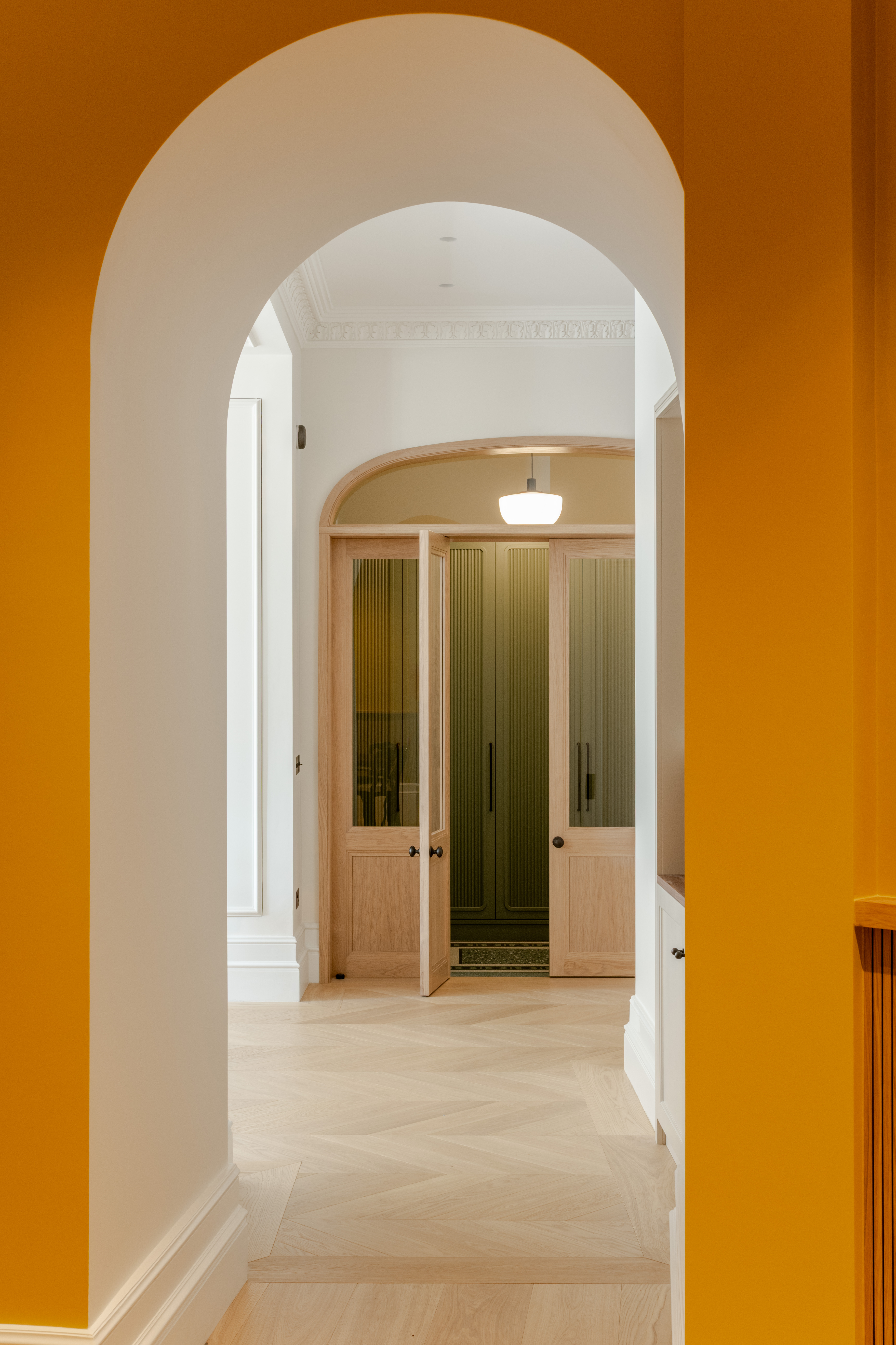 Curved hallway and entrancee doors