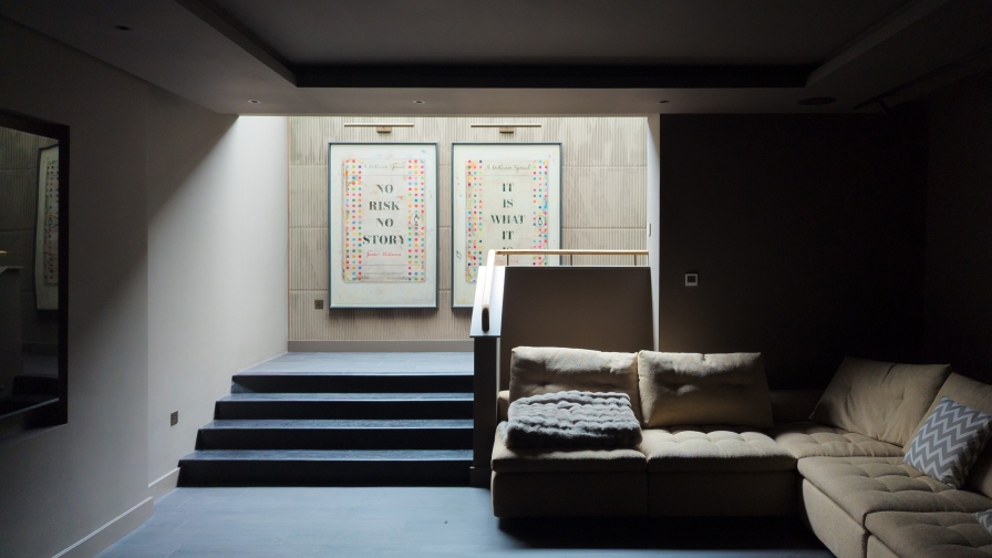 Air conditioning integrated with ceiling coffers in a luxury residential basement in Norfolk