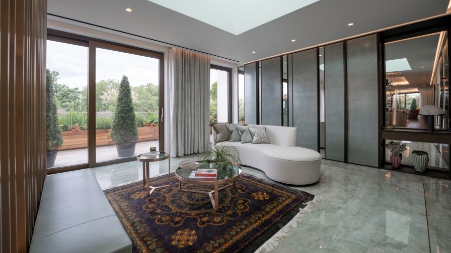 Perimeter slot air conditioning detailing in a high end penthouse interior environment