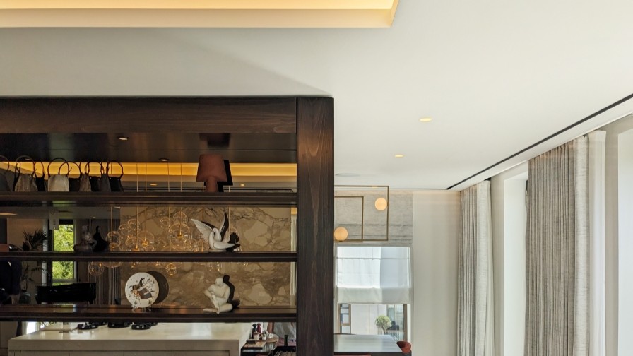 Perimeter slot air conditioning detailing in a high end penthouse interior environment