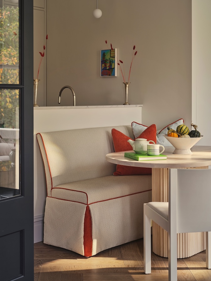 Rubelli upholstered dining bench with custom oval table for flexible  work and dining for compact living space