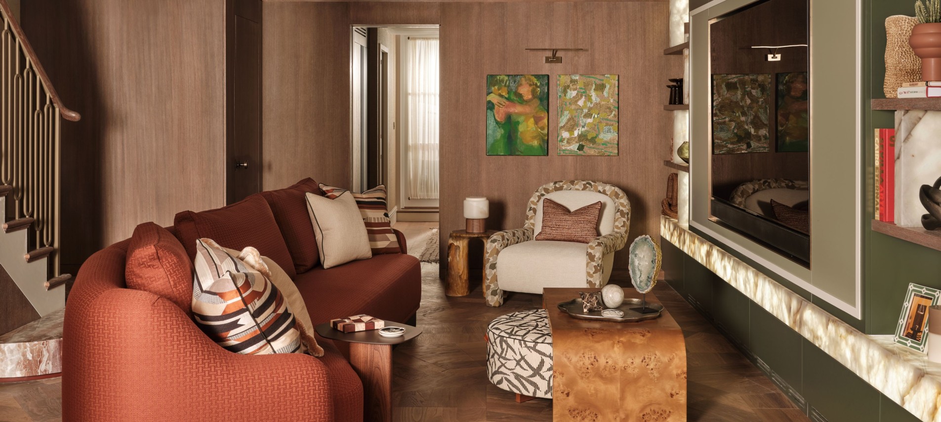 Living area, orange sofa green wall
