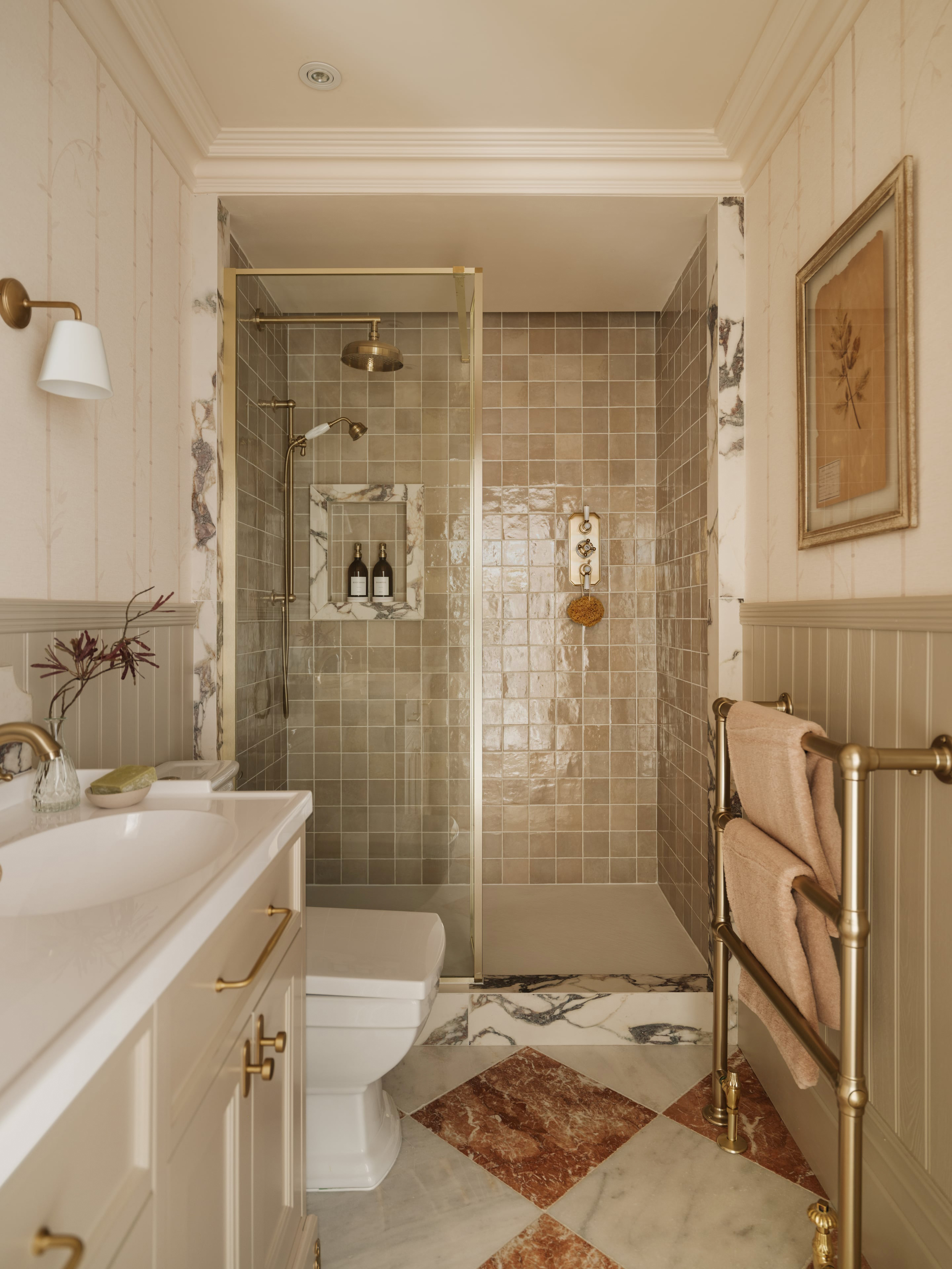 Marble tiled bathroom in a sussex victorian apartment 