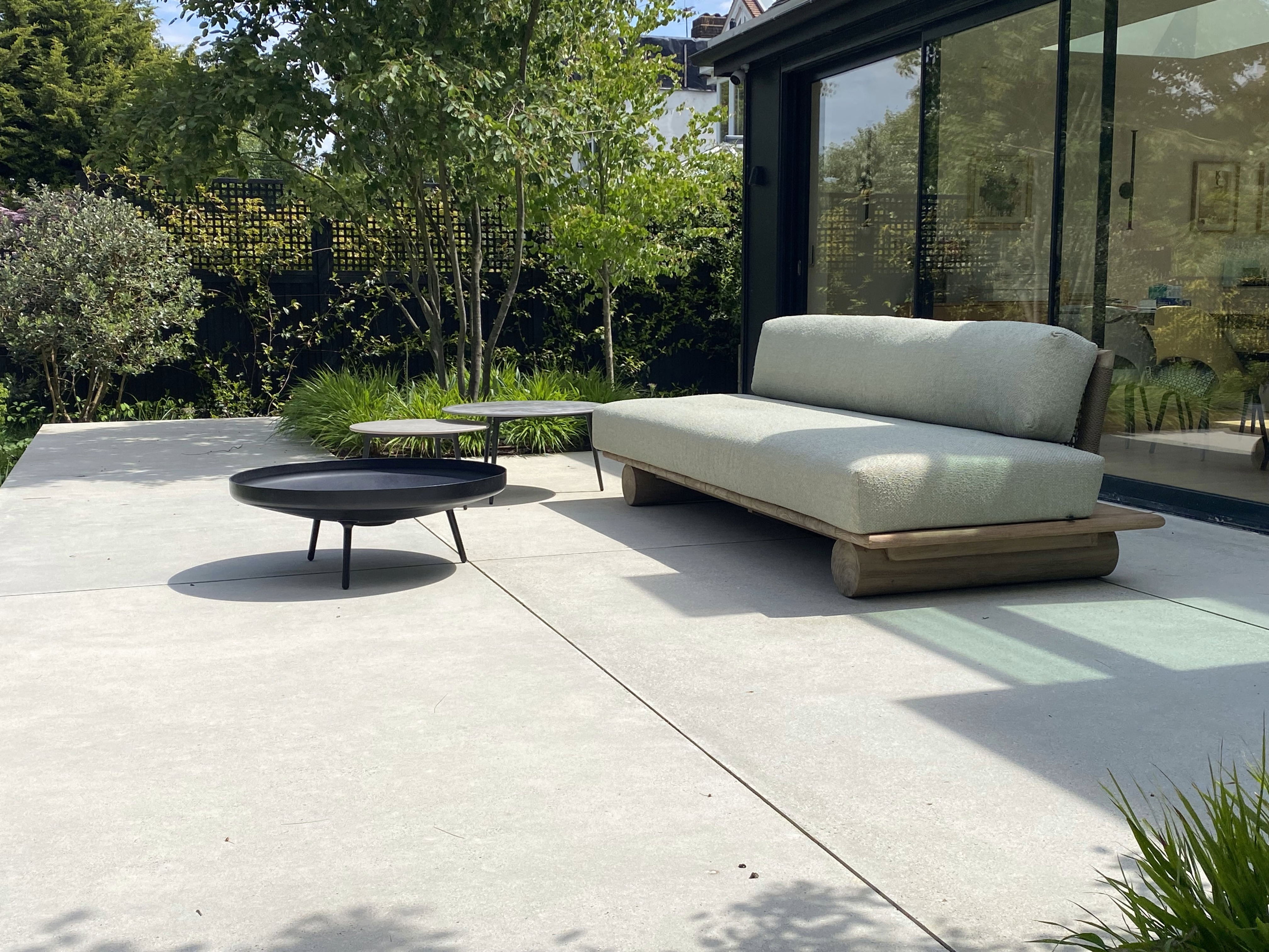 Image of Gommaire Edge sofa in minimalist terrace created by Kawauchi Rowe