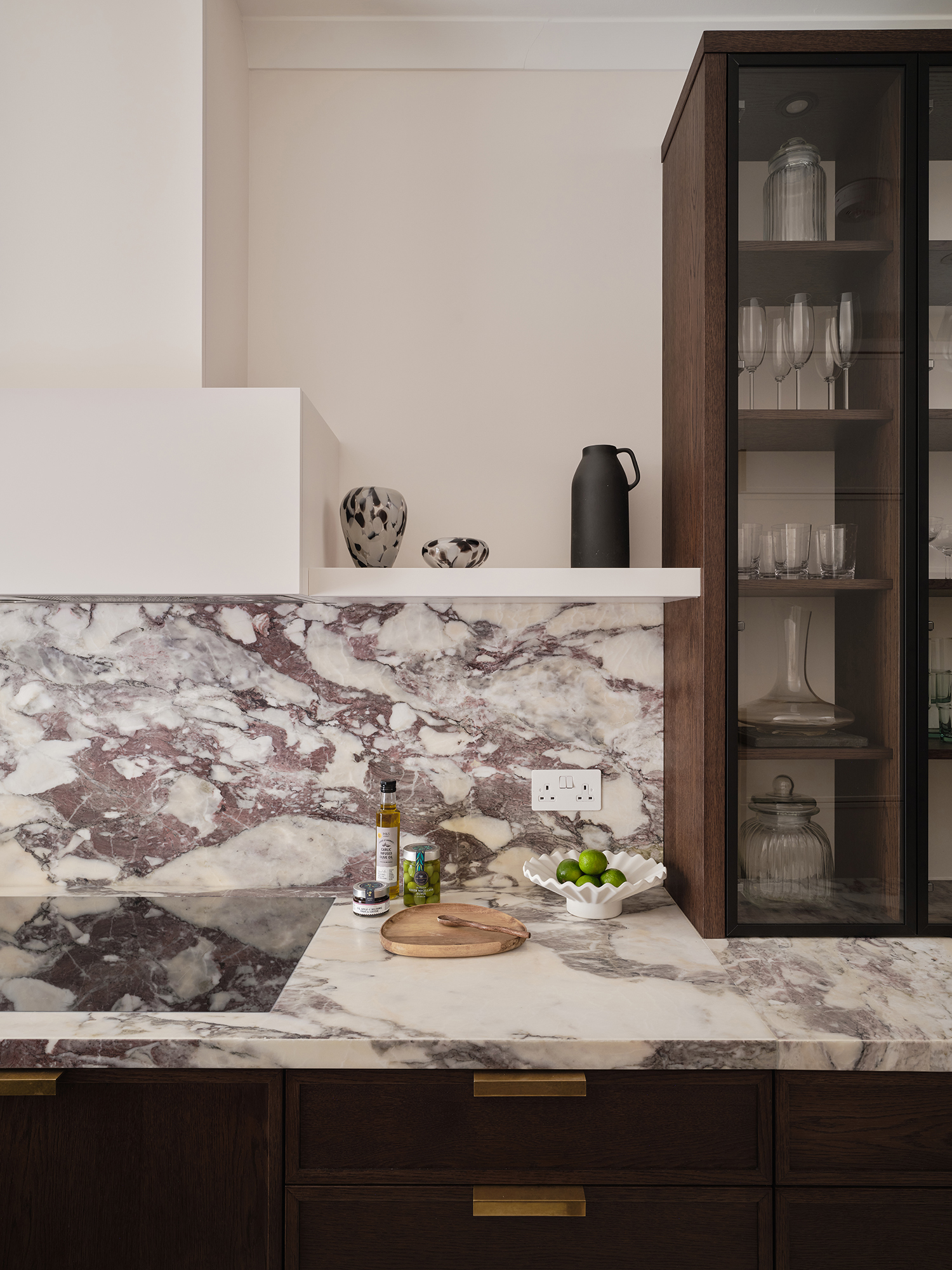 Bespoke kitchen cabinetry and floating shelves by Origins Design
