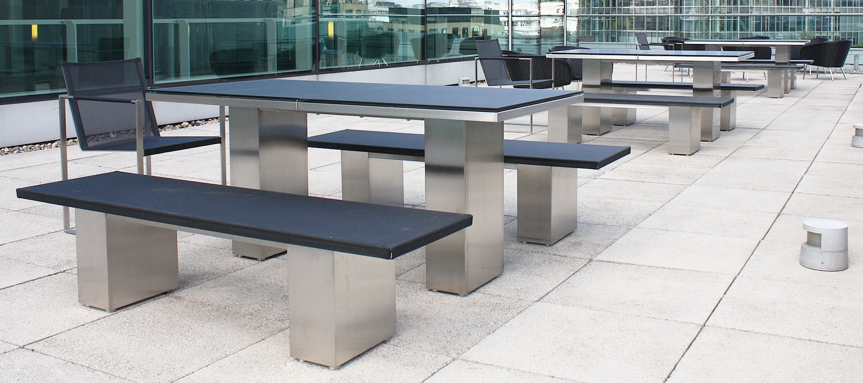 FueraDentro minimalist outdoor furniture on rooftop terrace in the City of London