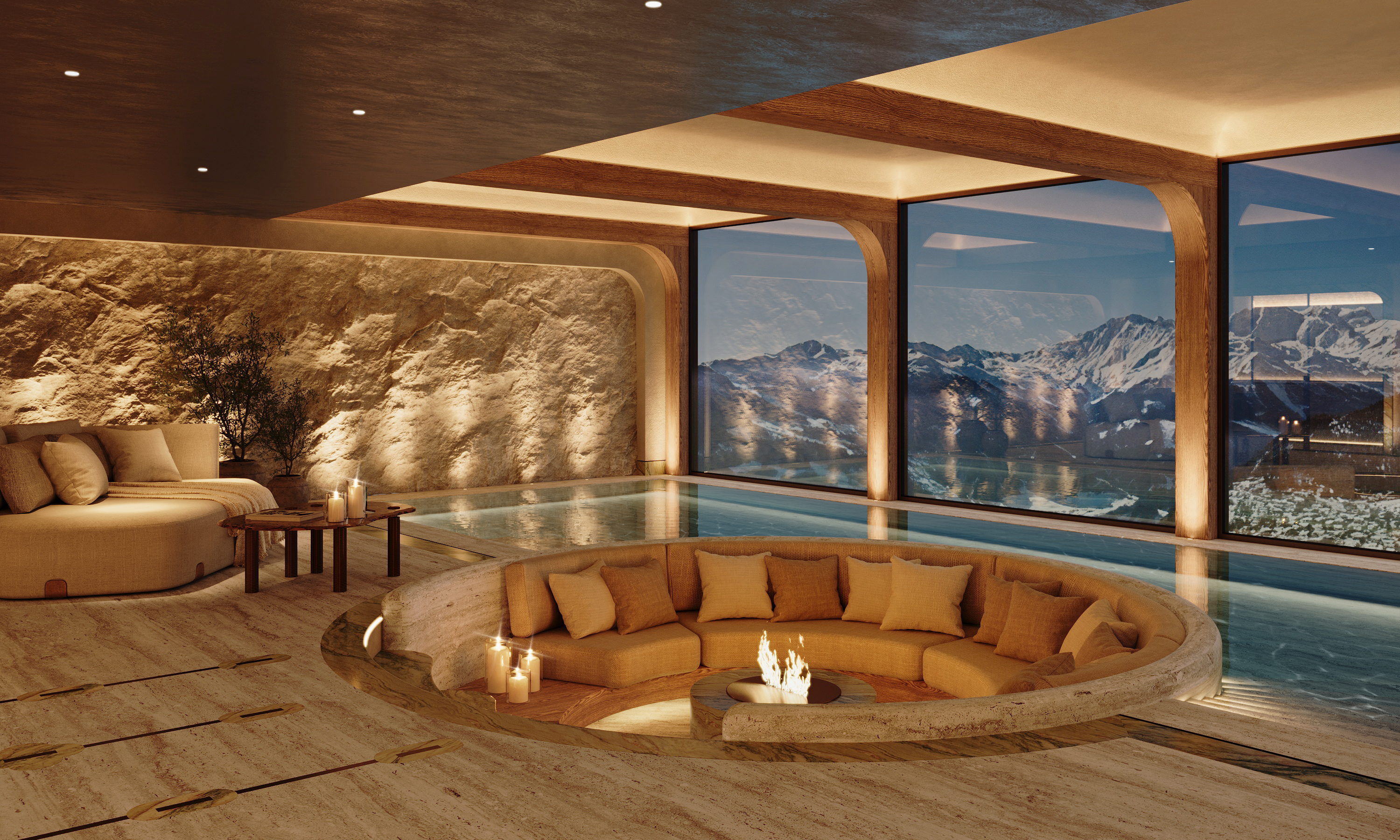 Sunken circular lounge with ochre seating around a central fire, beside an indoor pool overlooking snow-covered mountains.