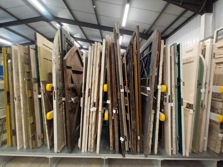 Selection of vintage doors on a rack
