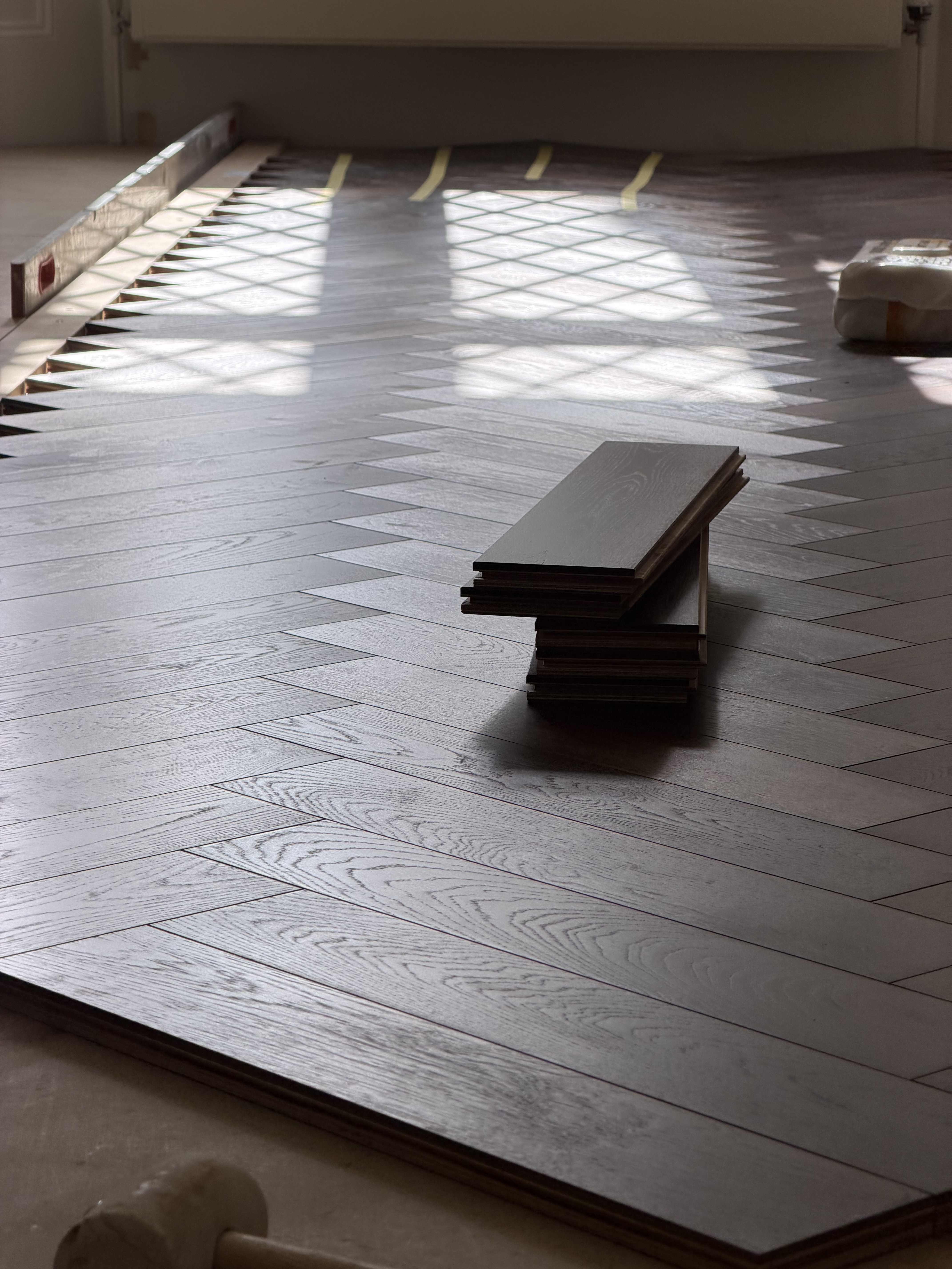 GBG installation of herringbone flooring.
