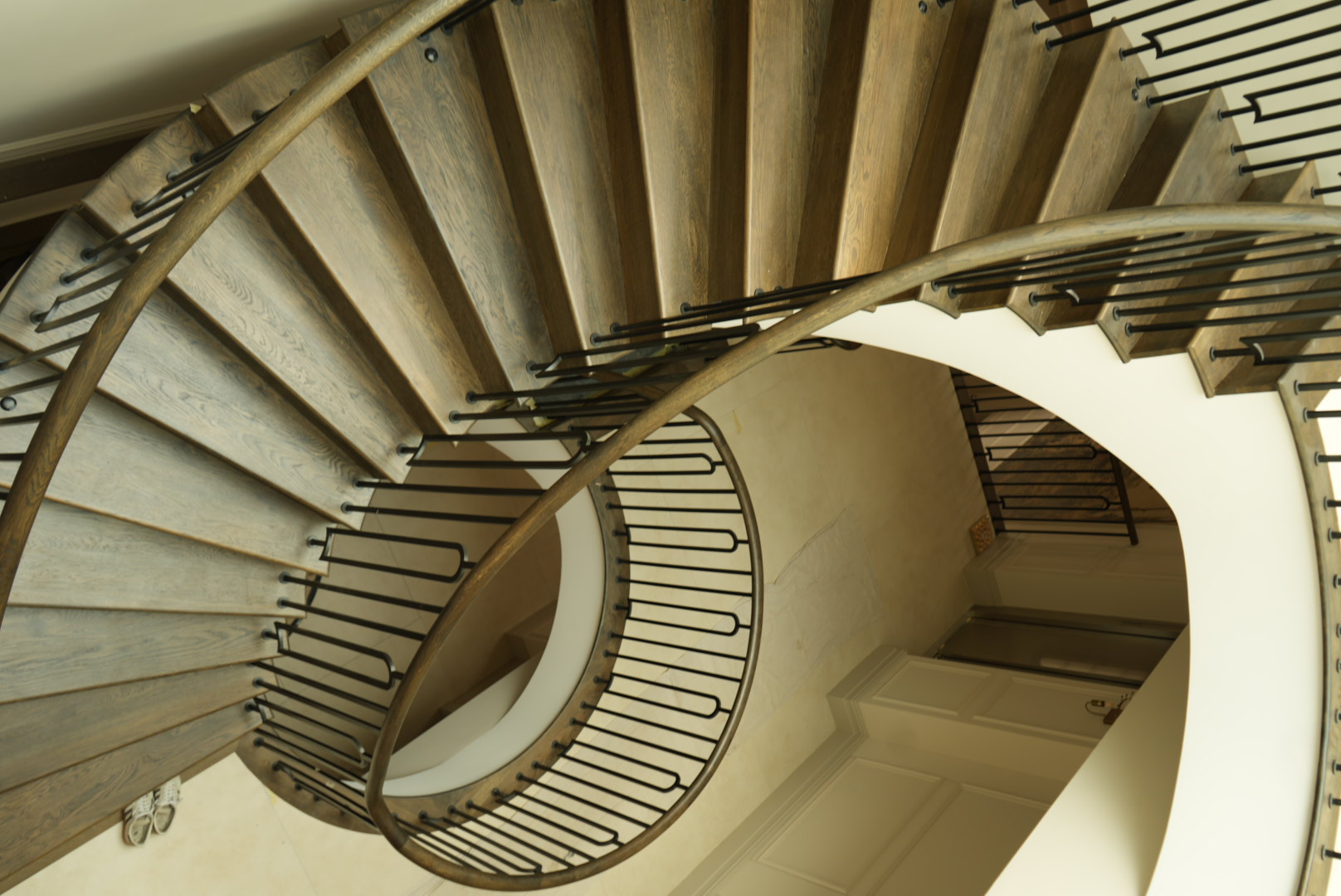 The stair climbing beneath the mural