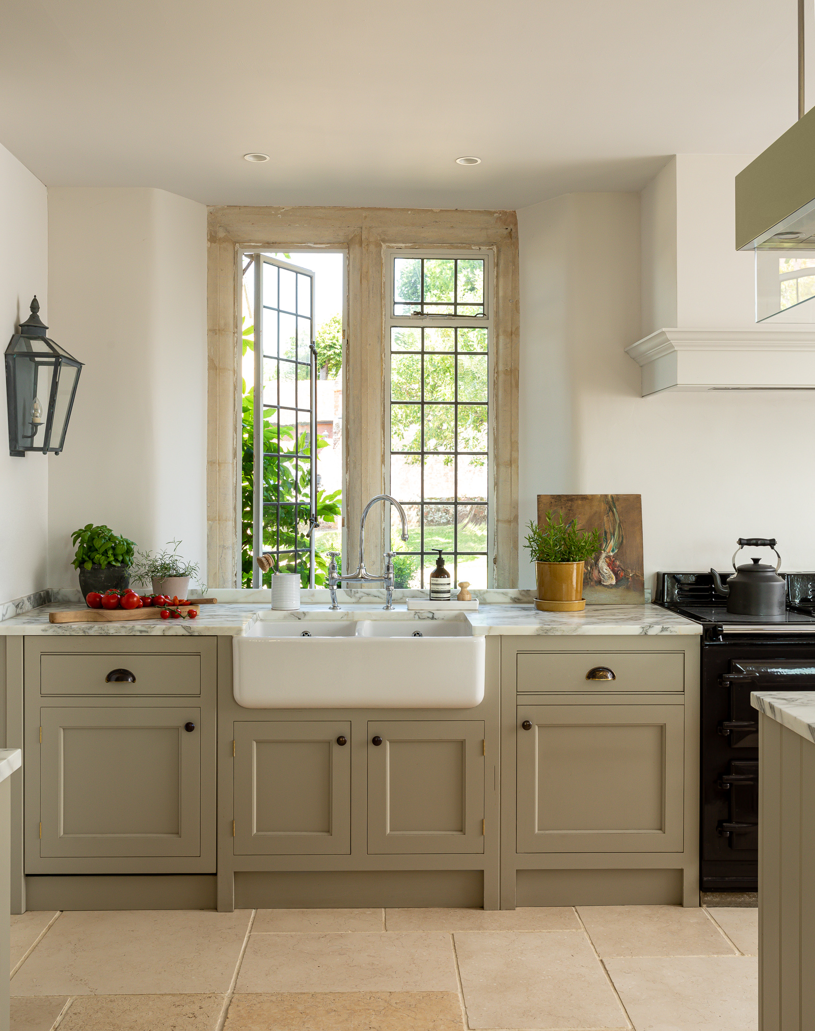 Painted shaker kitchen in Elisabethan Listed home with butlers sink and marble worktop