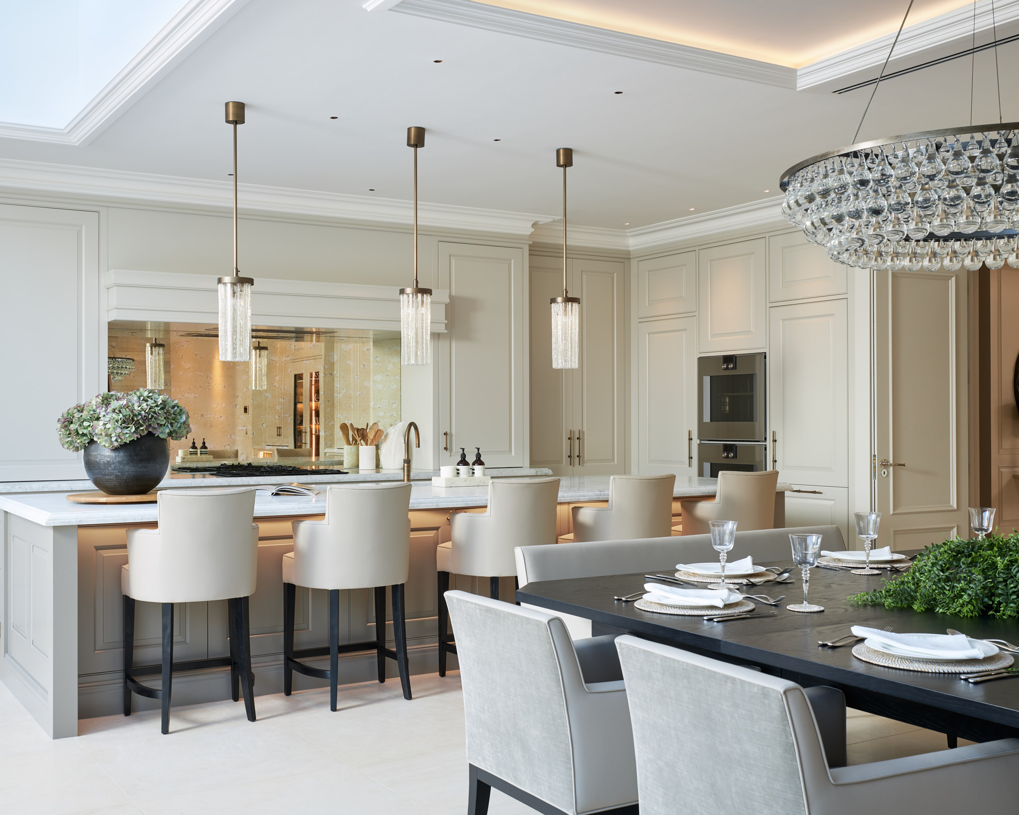 Shaker kitchen with large island and pendant lights with square table