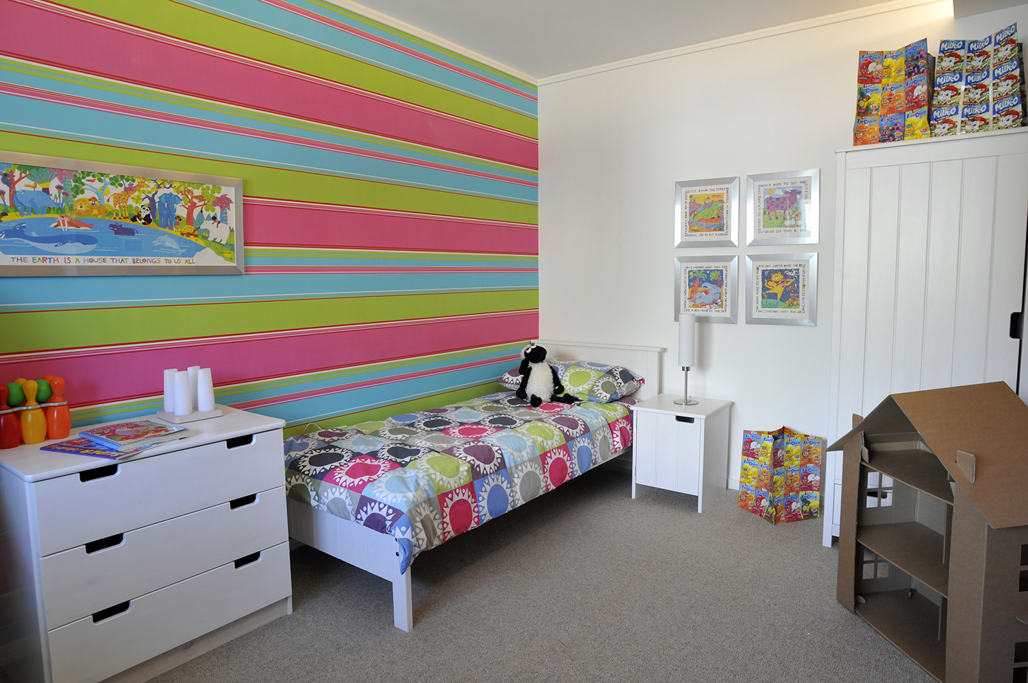 This child’s bedroom is finished in environmentally sensitive materials. The storage bags are made from recycled packaging.