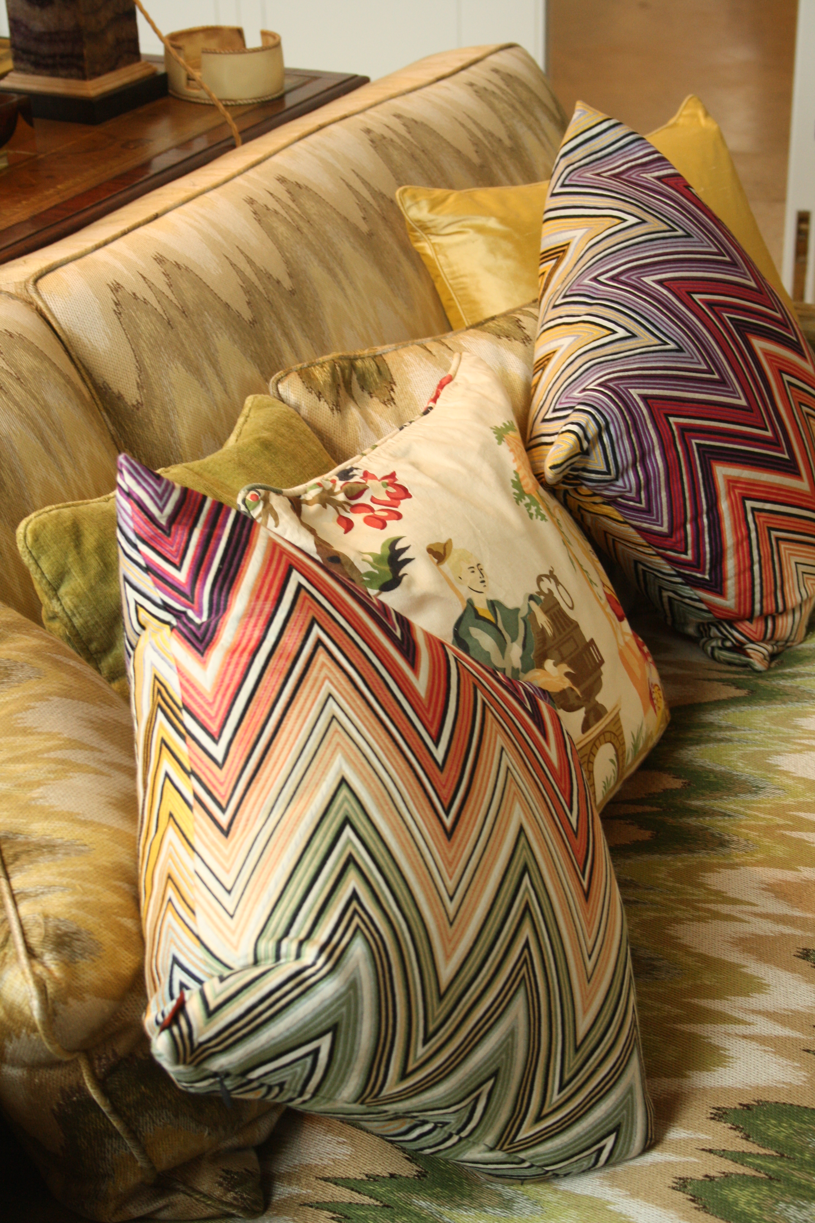 Missoni cushions sit with traditional Chinoiserie and Flame Stitch fabrics