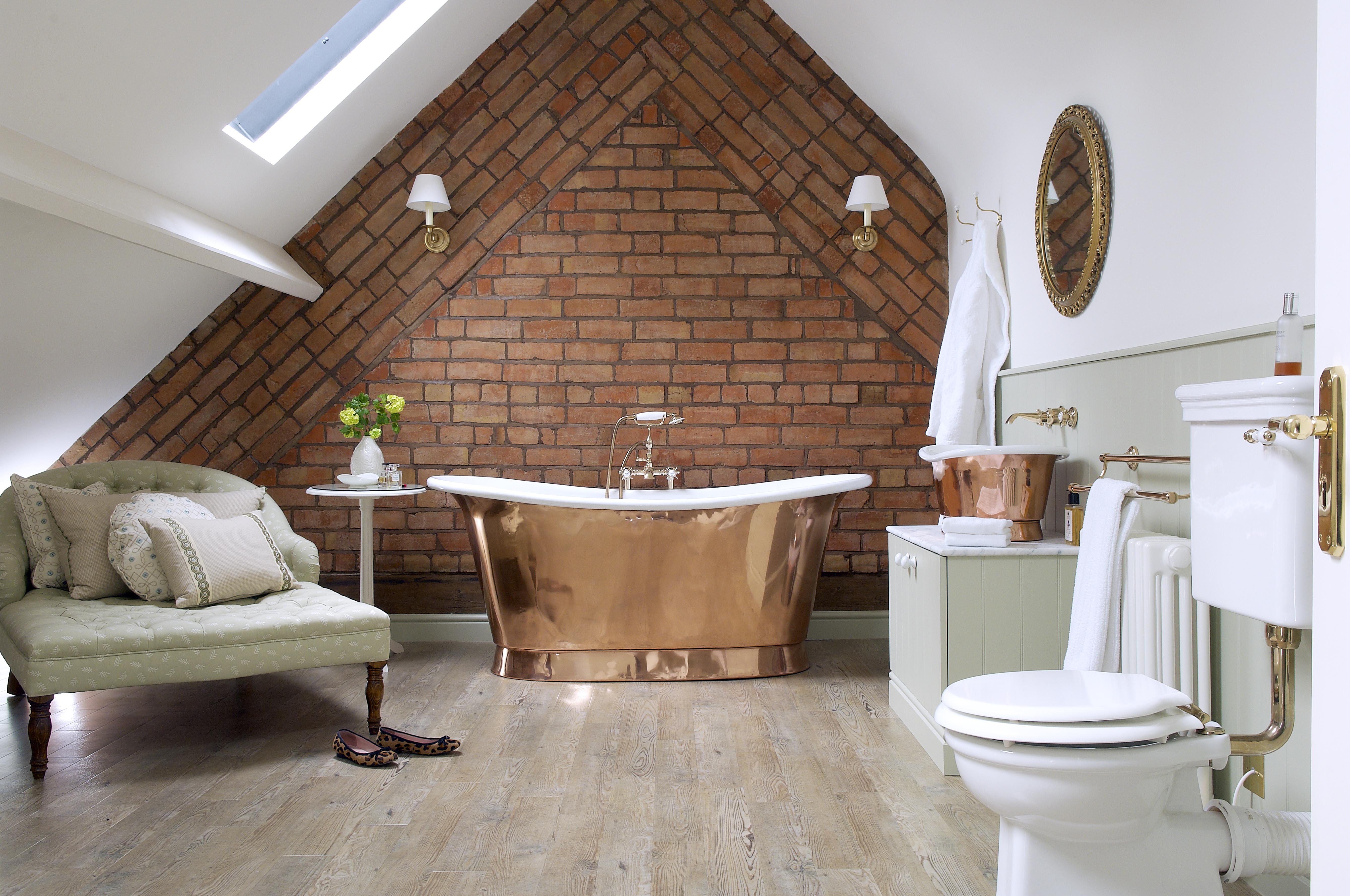 We created this en-suite bathroom in what was previously unused loft space, the copper bath providing a practical but stunning focal point