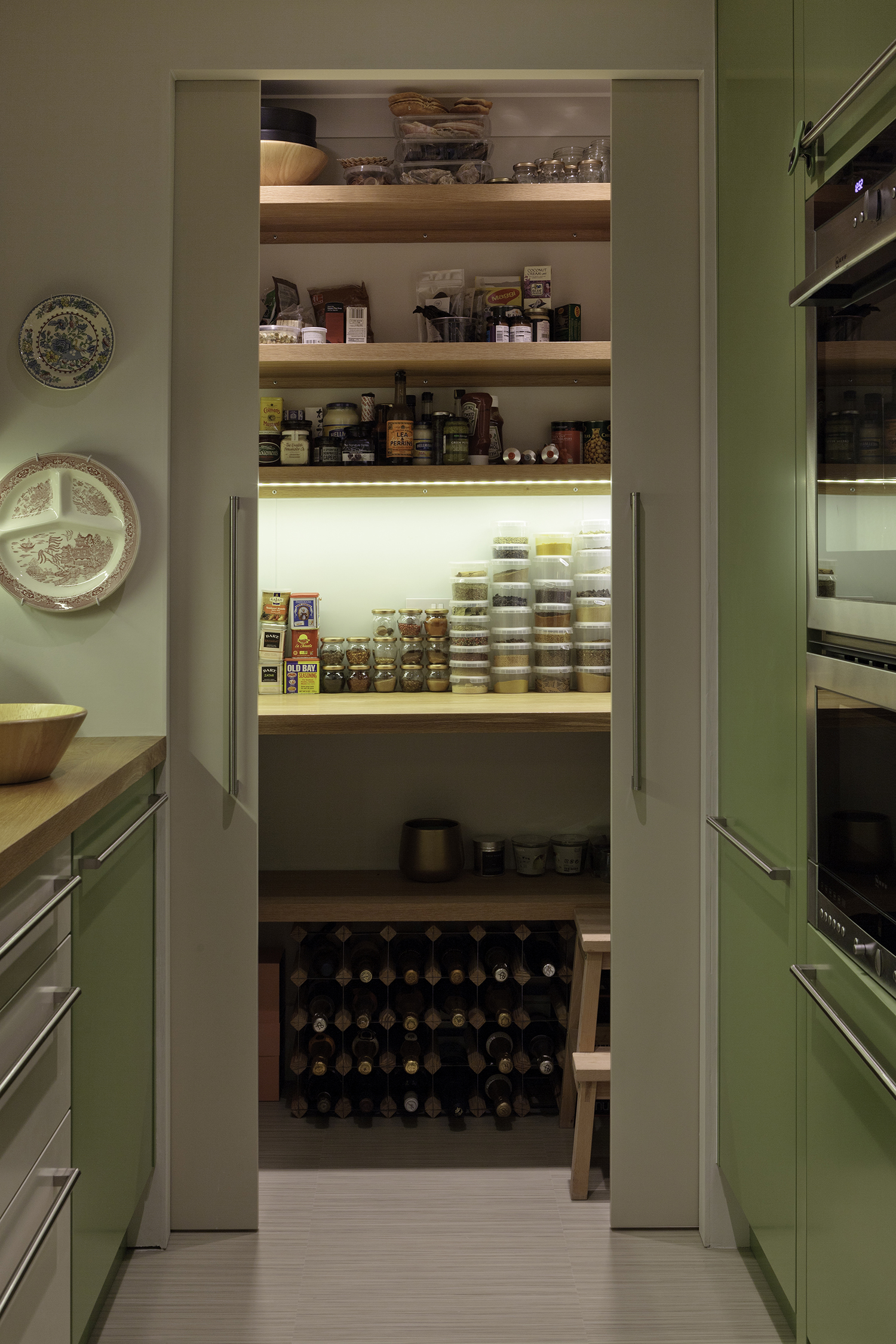 A larder was created at the end of the wedge-shaped kitchen. As well as storage there is an additional well-lit work surface.