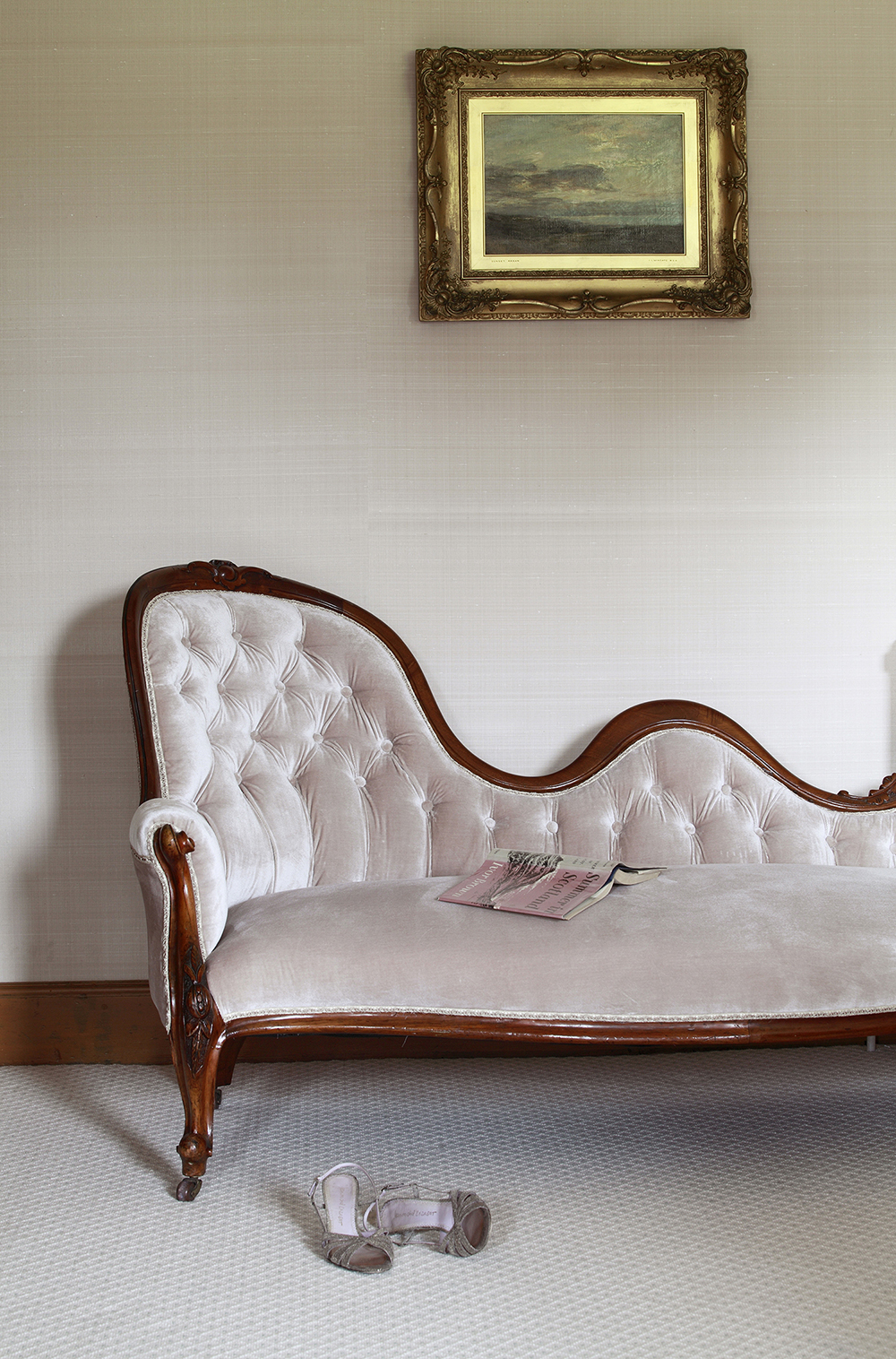 Another antique upholstered in a blush pink silk velvet.