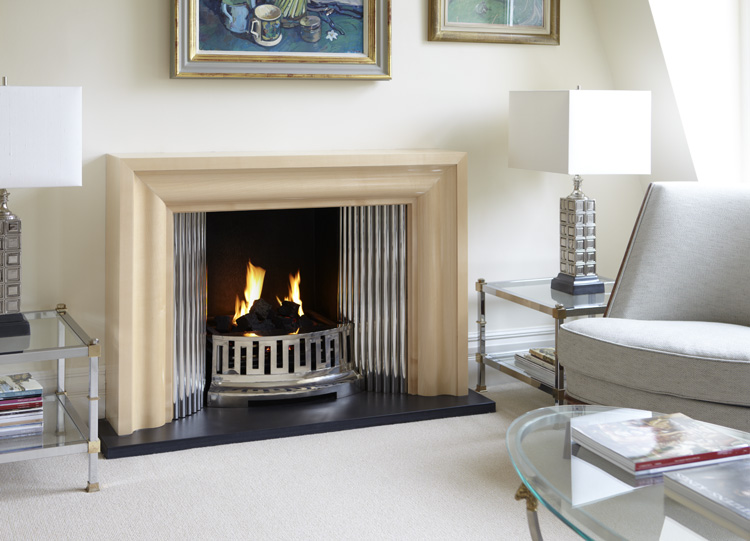 The fireplace showcases the bespoke fire grate.