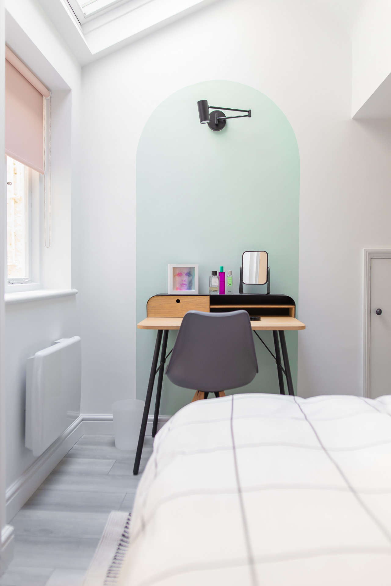 Guest room with pastel wall shapes
