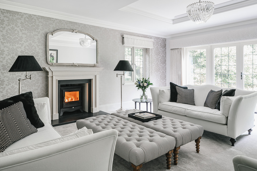 Luxury formal living room using black and white colour scheme.