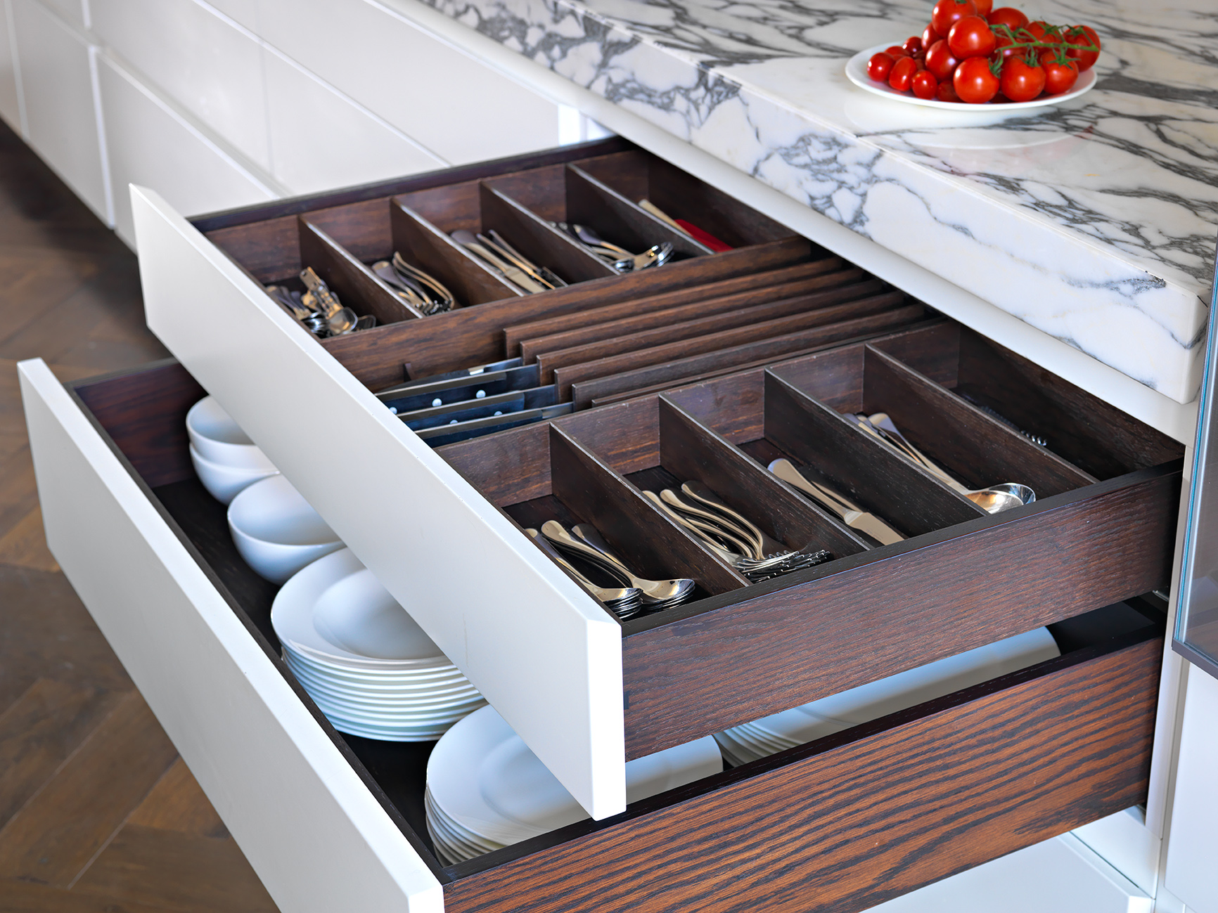 Stained oak cutlery and crockery drawers by Williams Ridout