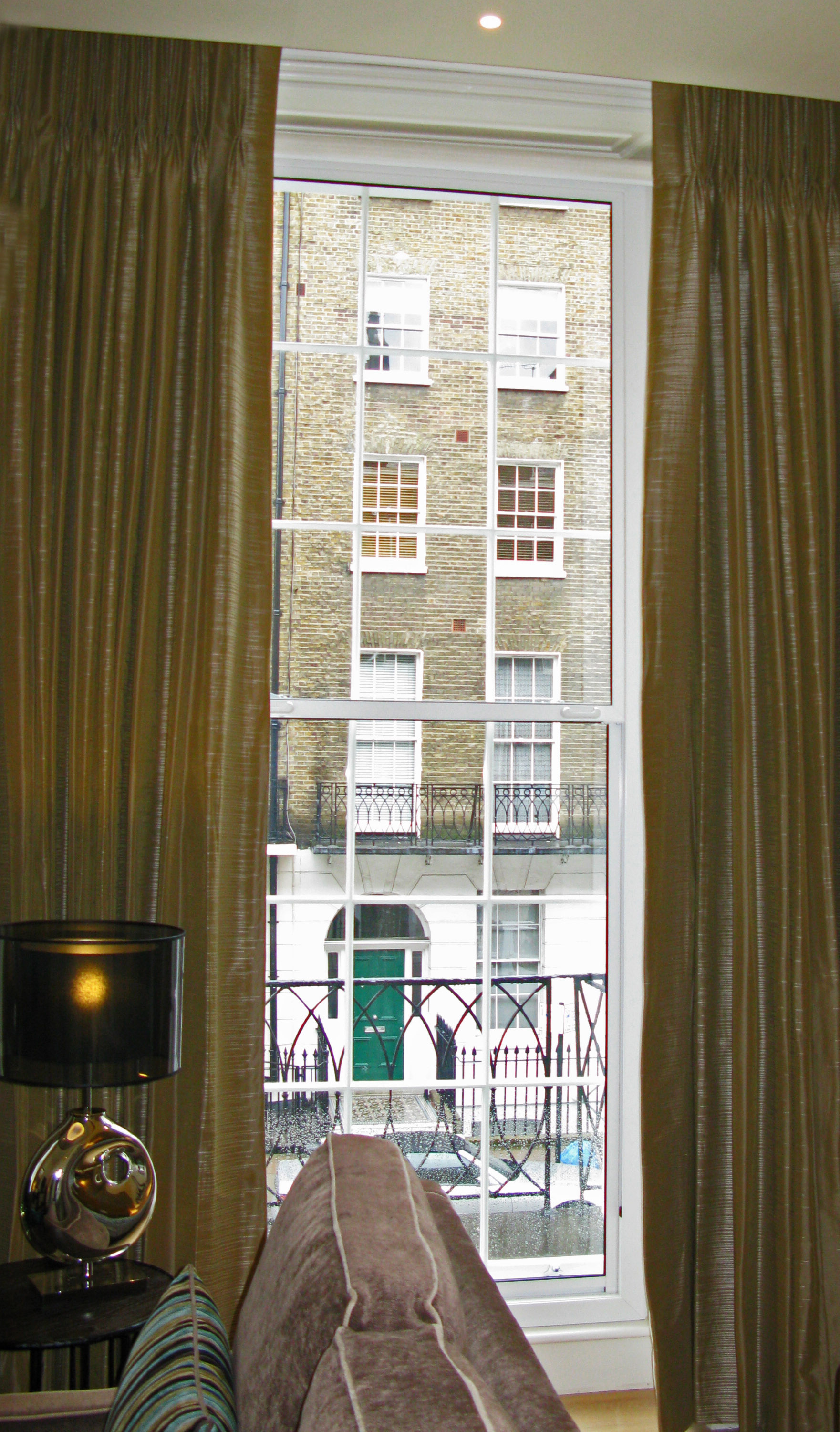 Large vertical sliding secondary glazing at the Arch Hotel, London