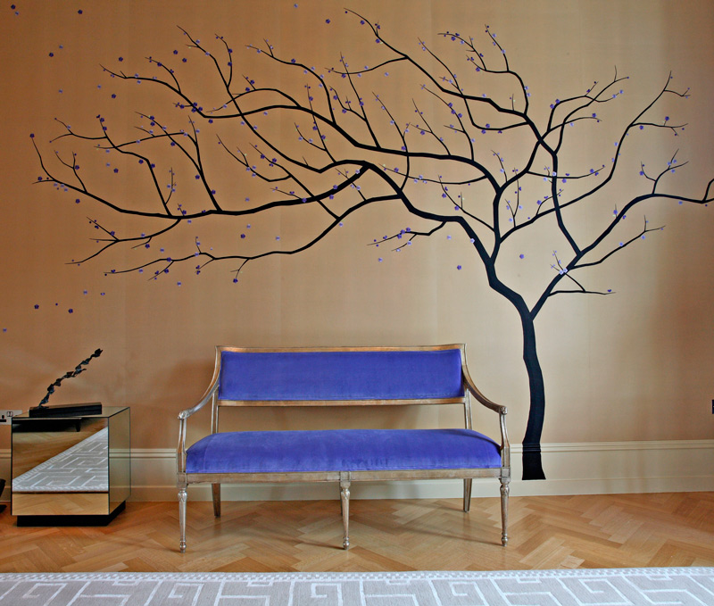 Upon entering the space an embroidered tree bends toward the large adjoining reception room.