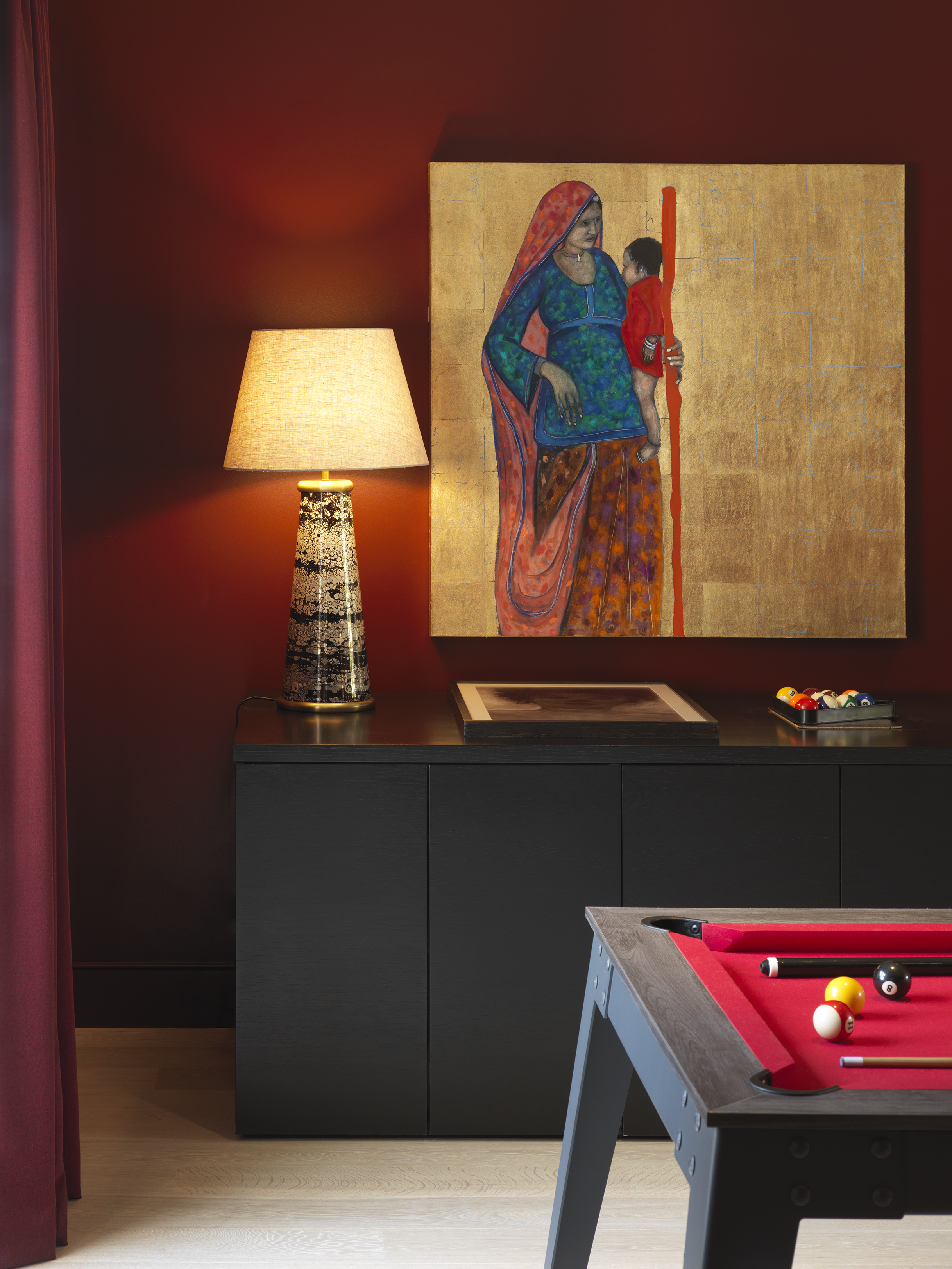 TV and Games room- Deep, dark red gloss paint,  fabric matched to wall colour  