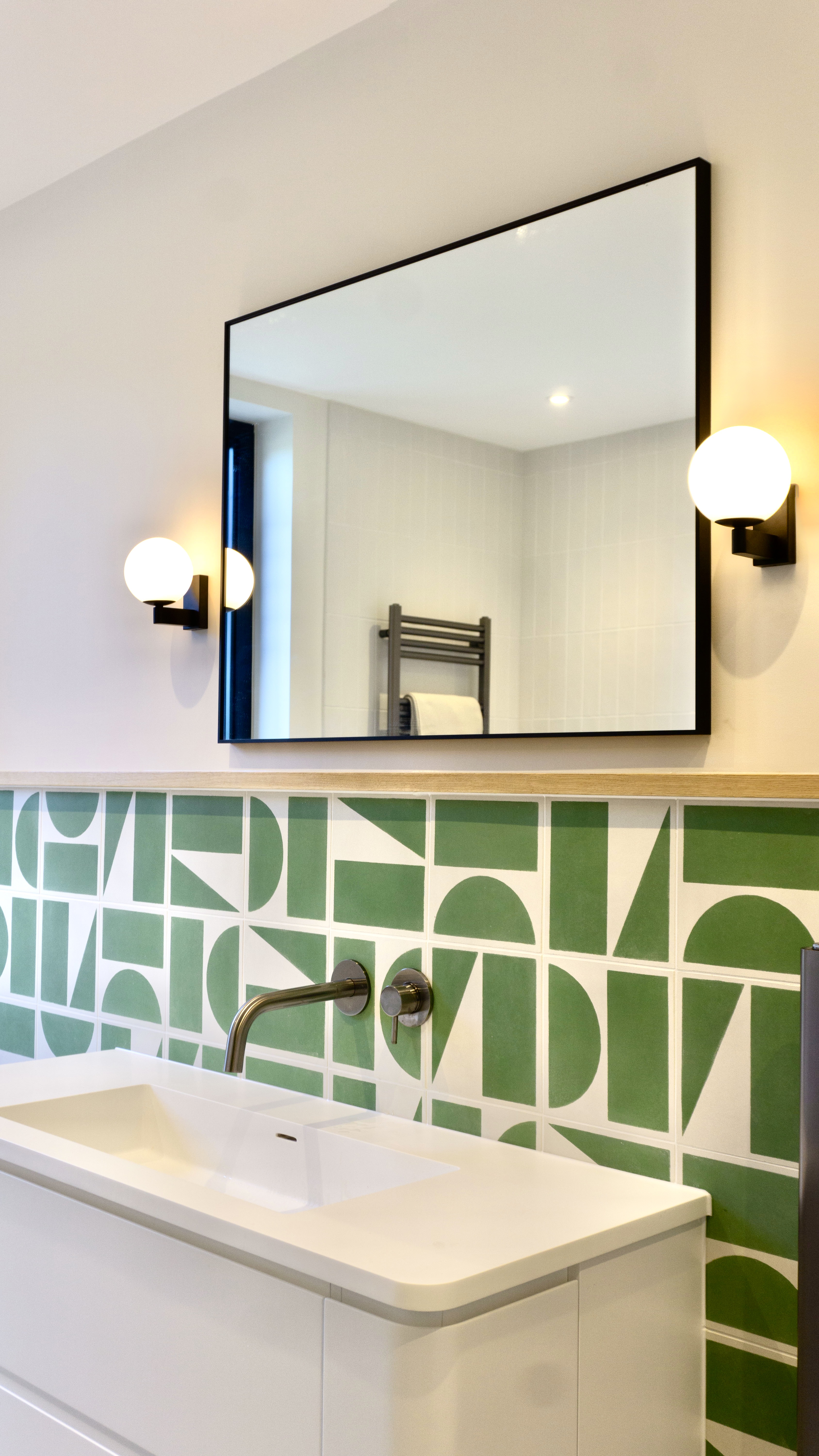 Bathroom with fun green tiles