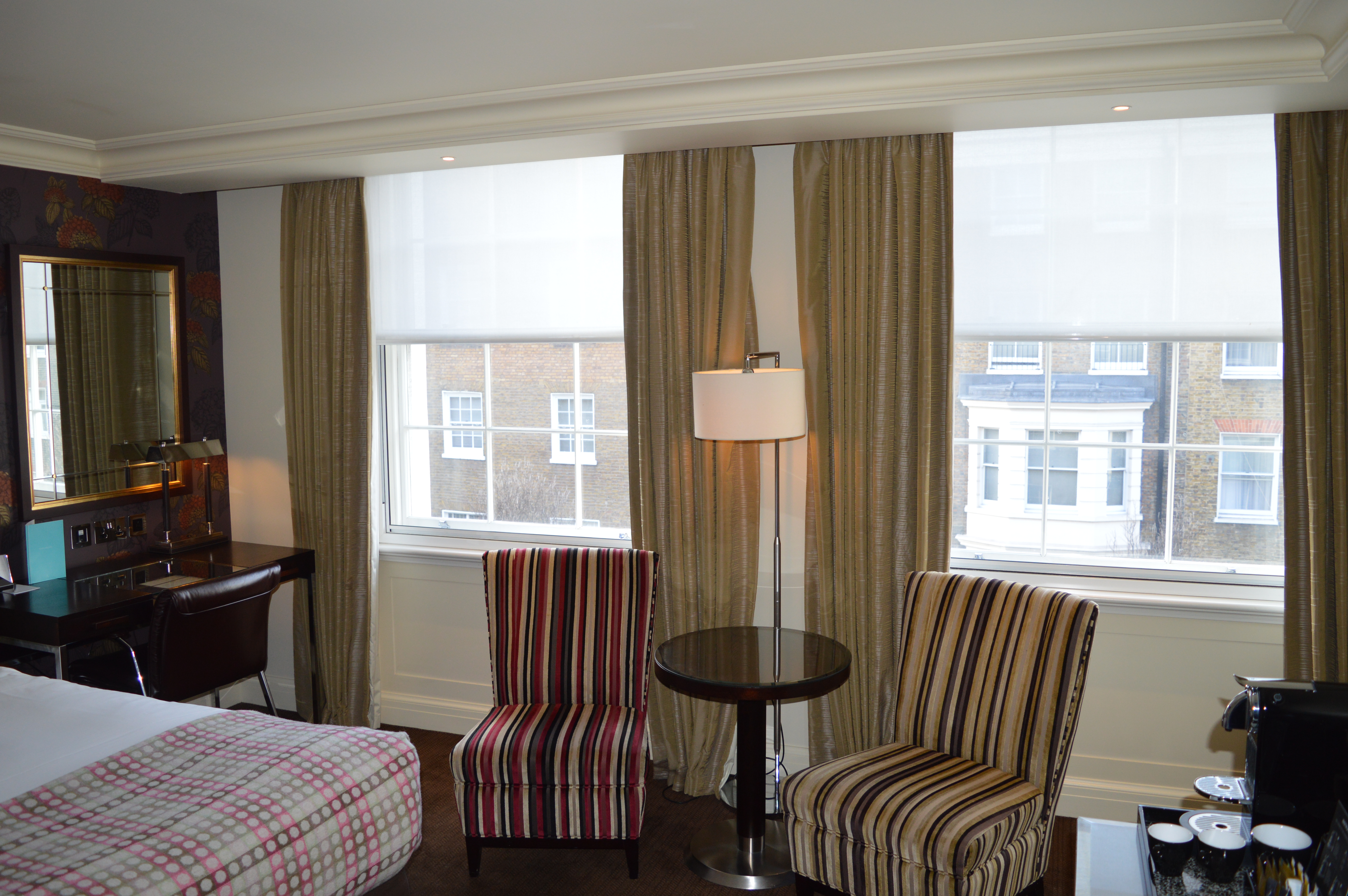 Matching pair of windows in the Arch Hotel London, treated with secondary gazing and blinds re hung in front.