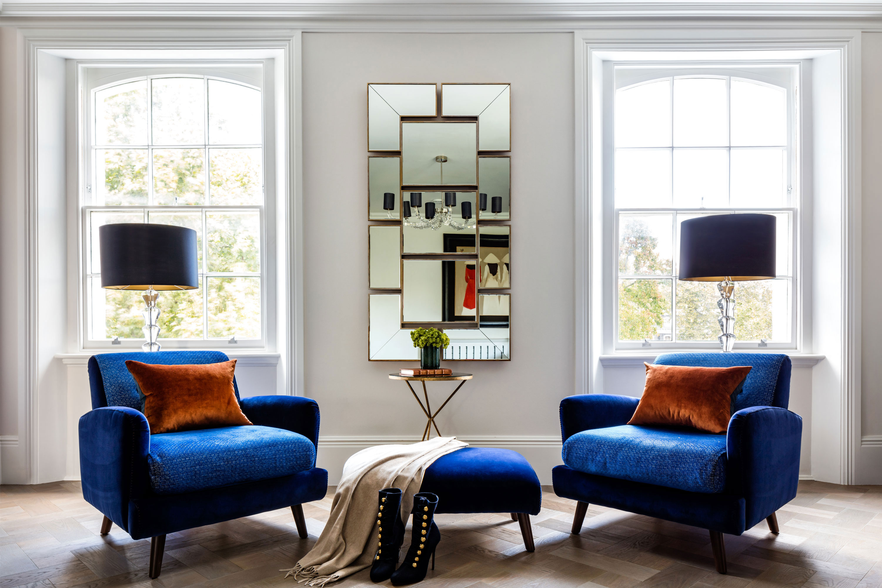 Elegant interior, rich blue chairs, classic symmetry