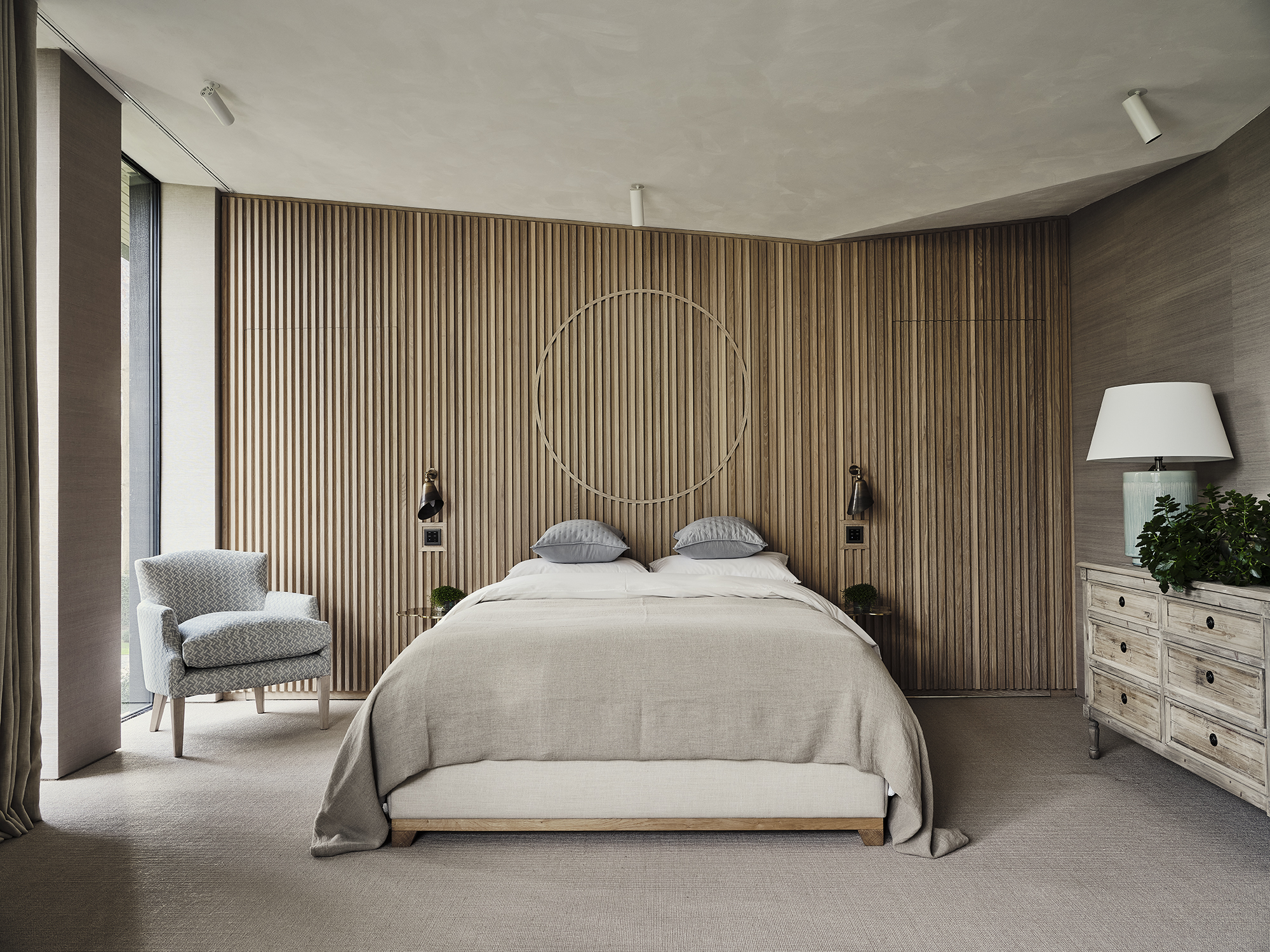 timber joinery wall linen bed and chair sisal flooring 