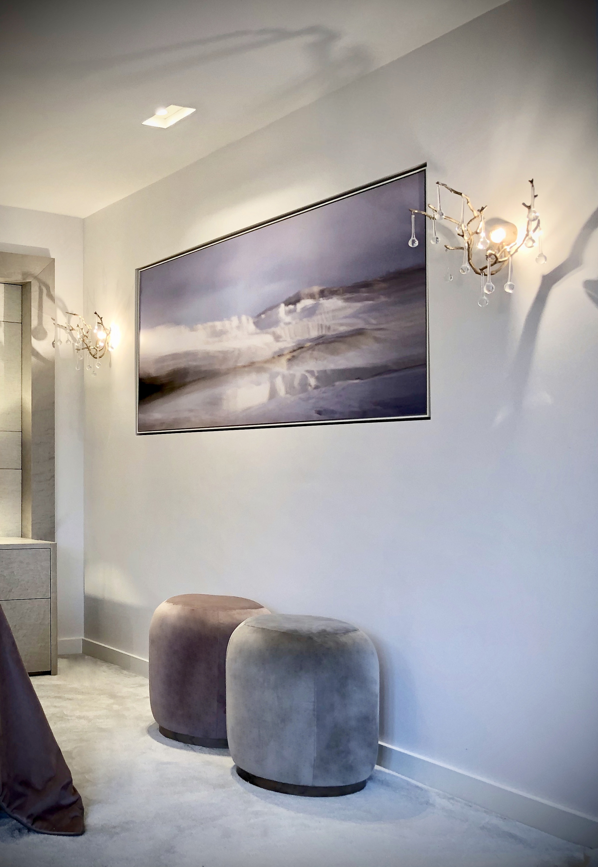 Recessed art with elegant wall lights velvet footstool