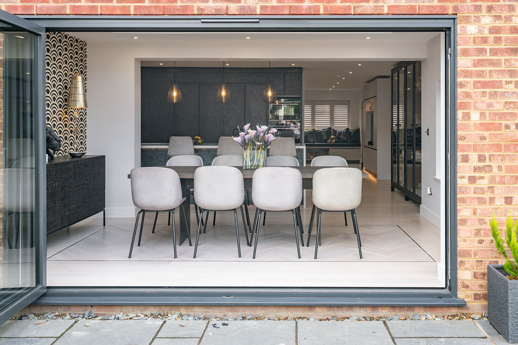 Extension to home with an orangery space with dining and kitchen in a modern style