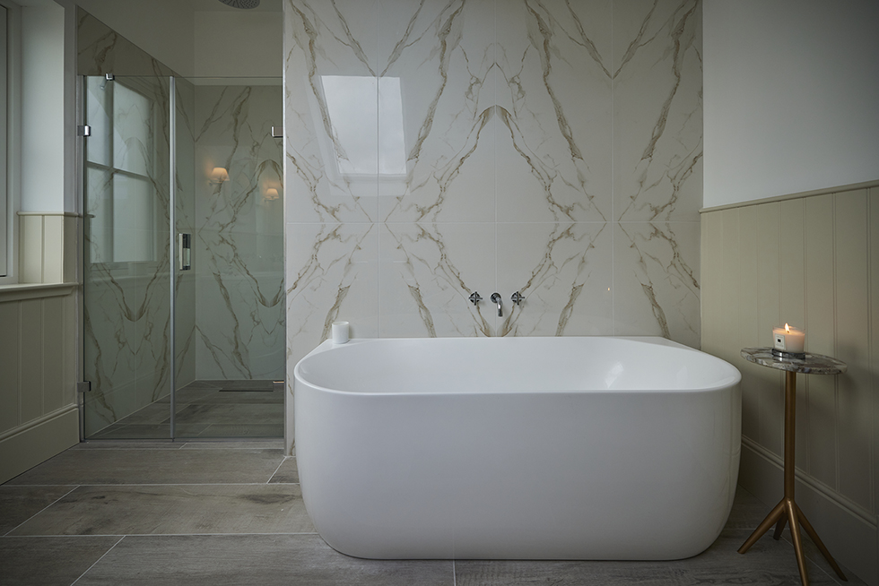 Lapicida bookmatch porcelain marble make a feature in a stunning master bathroom