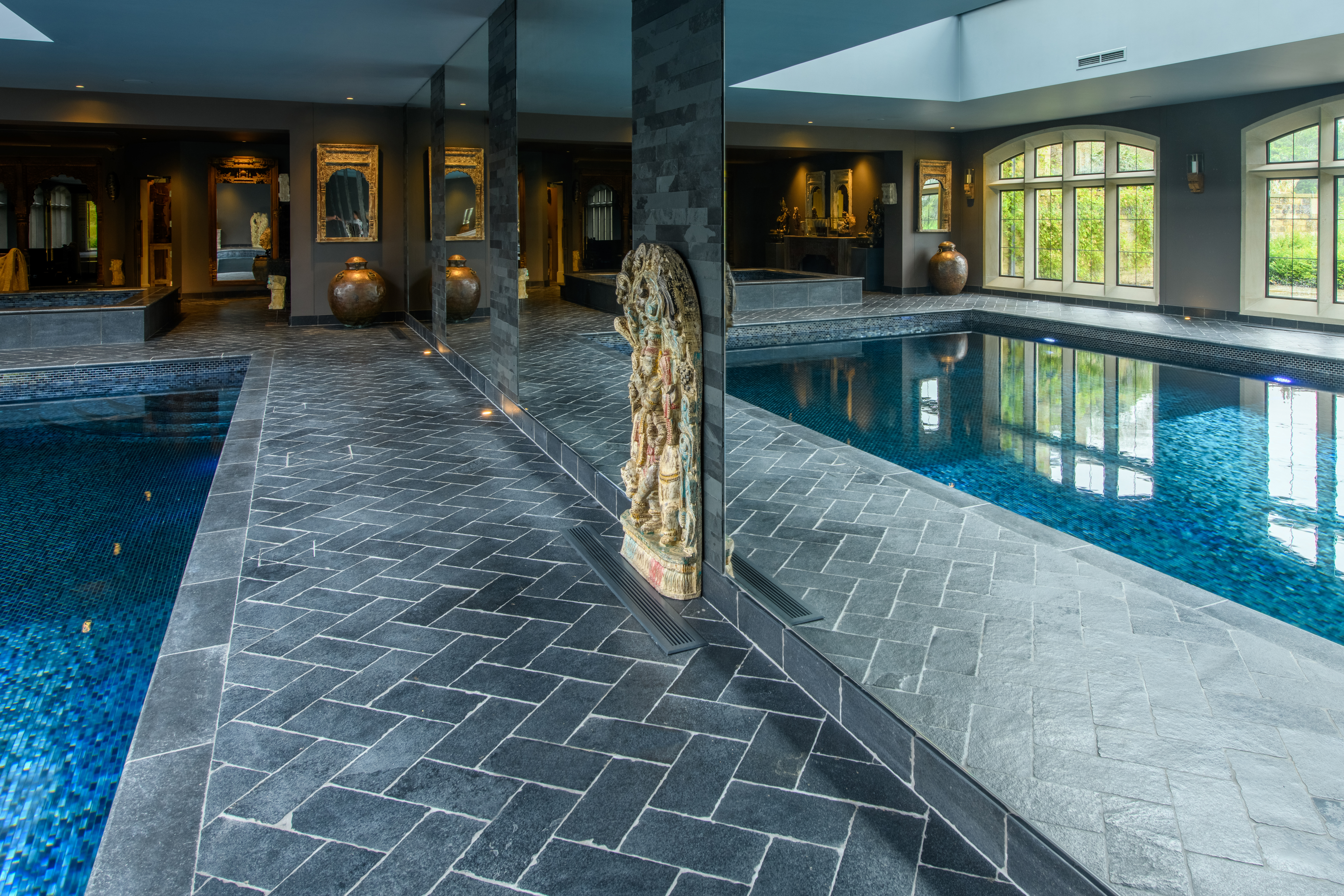 Luxury stone surfaces provided by Lapicida for client swimming pool