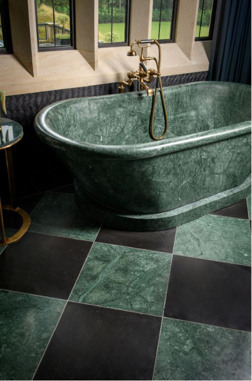 Green marble and marble bath provided by specialists Lapicida for client bathroom