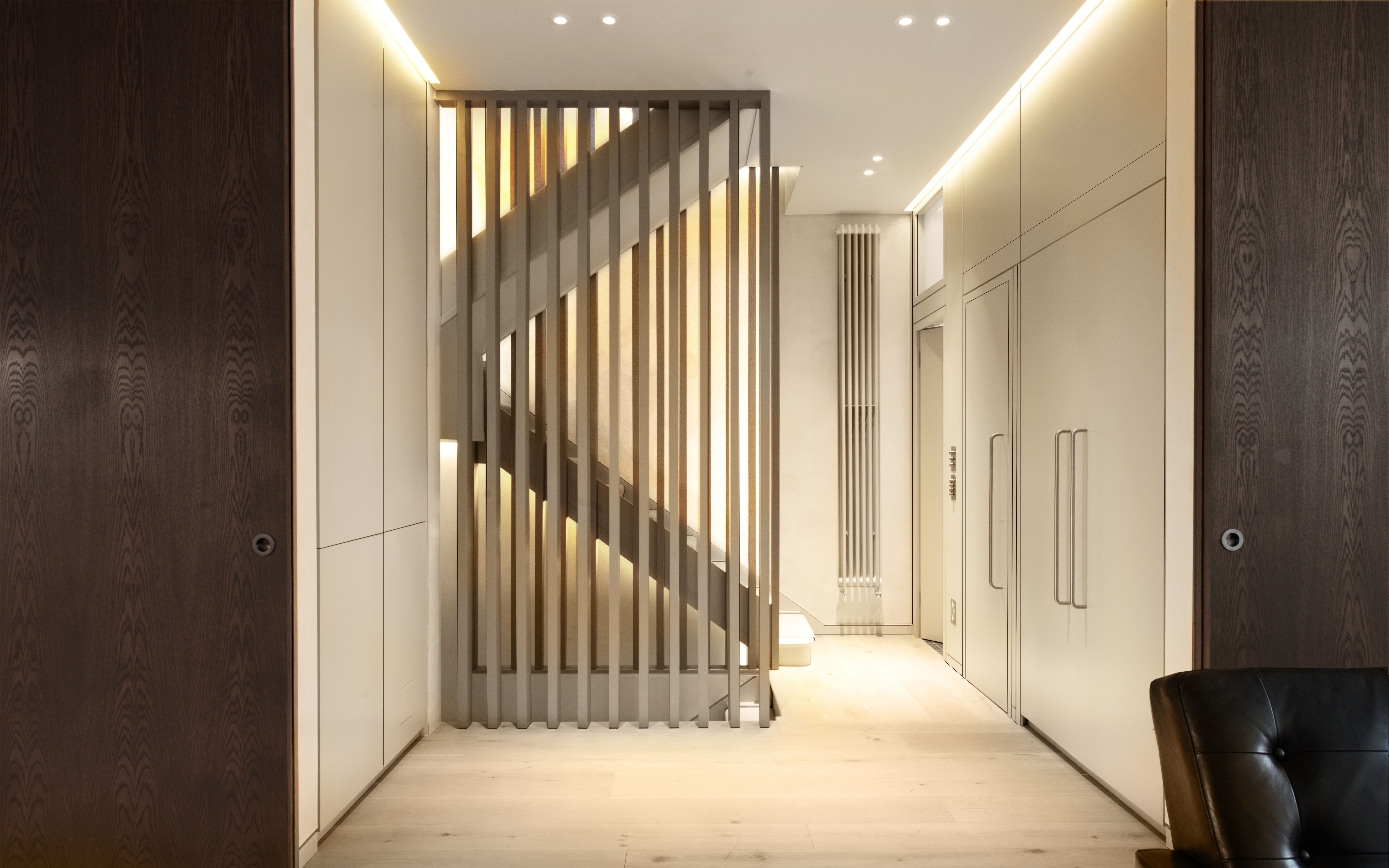 Staircase wooden balustrade lighting Zehnder radiators