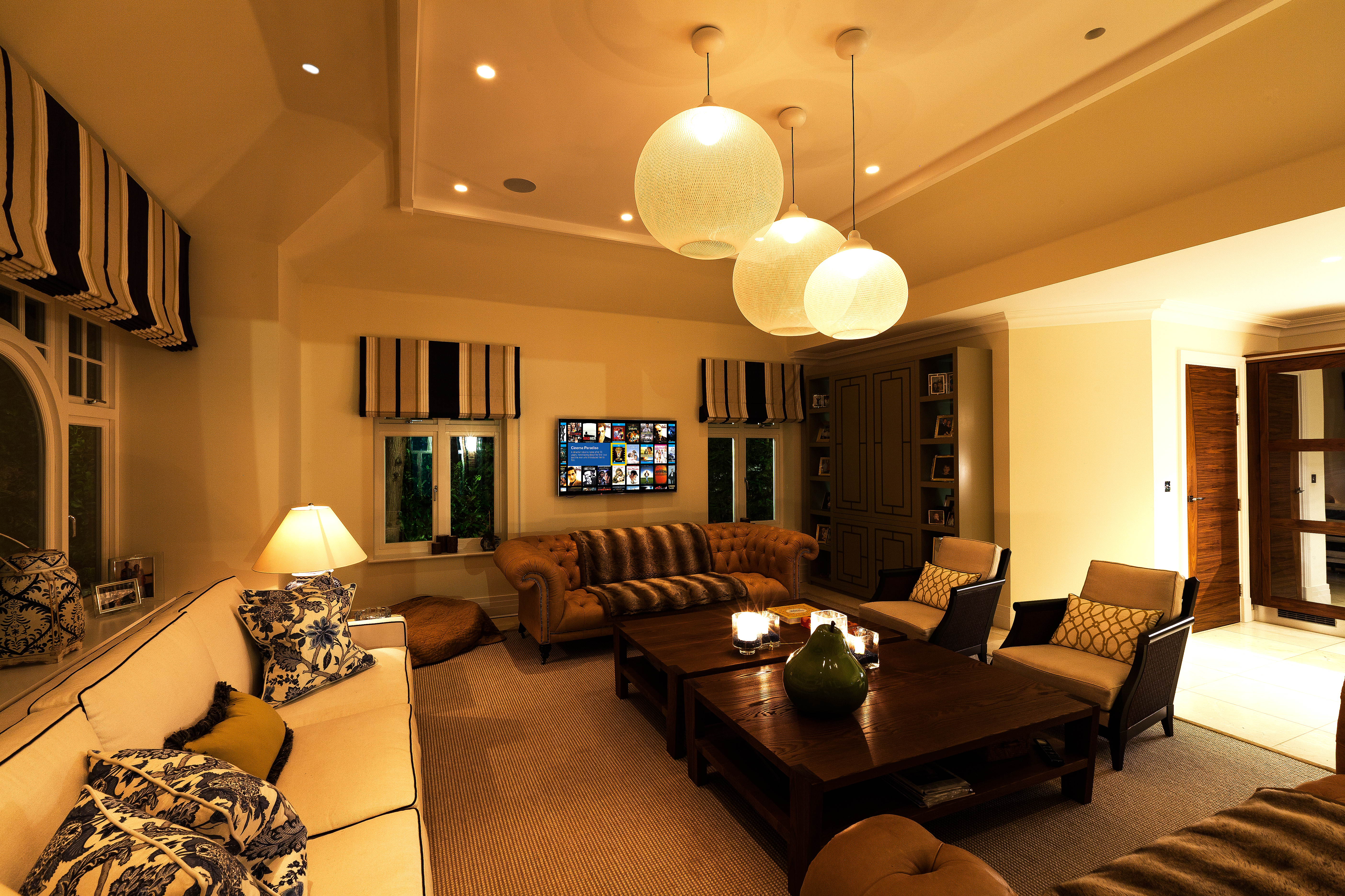 Media room with Lutron lighting and Kaleidescape movie server.