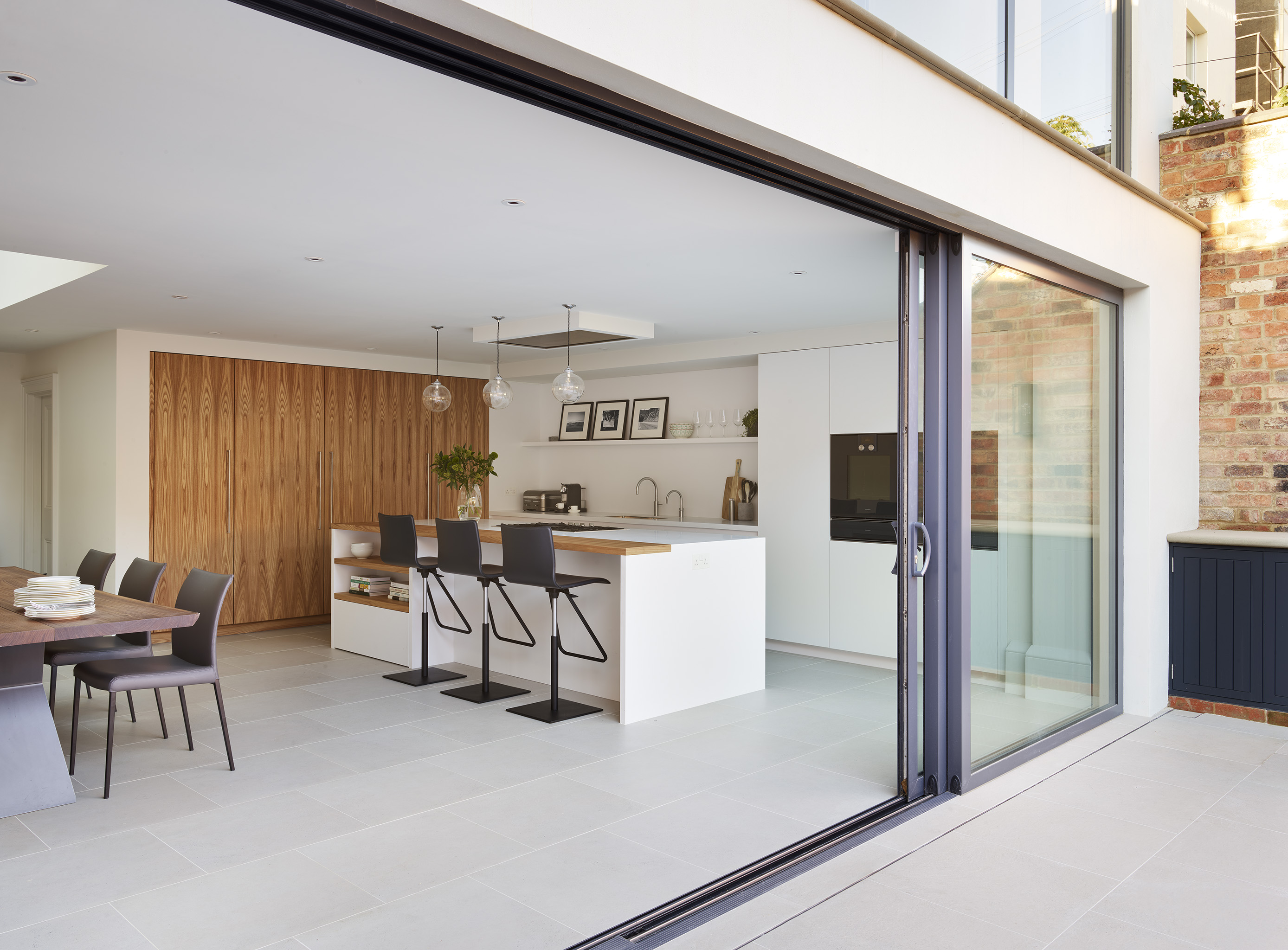 Onestà Cheltenham Bespoke Kitchen with elm veneer larder 