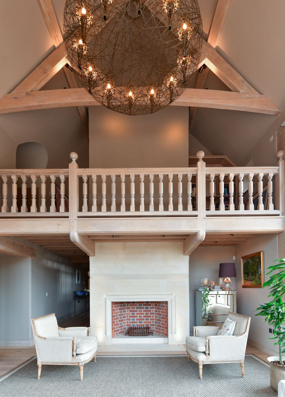 Bespoke feature light within double height gallery room