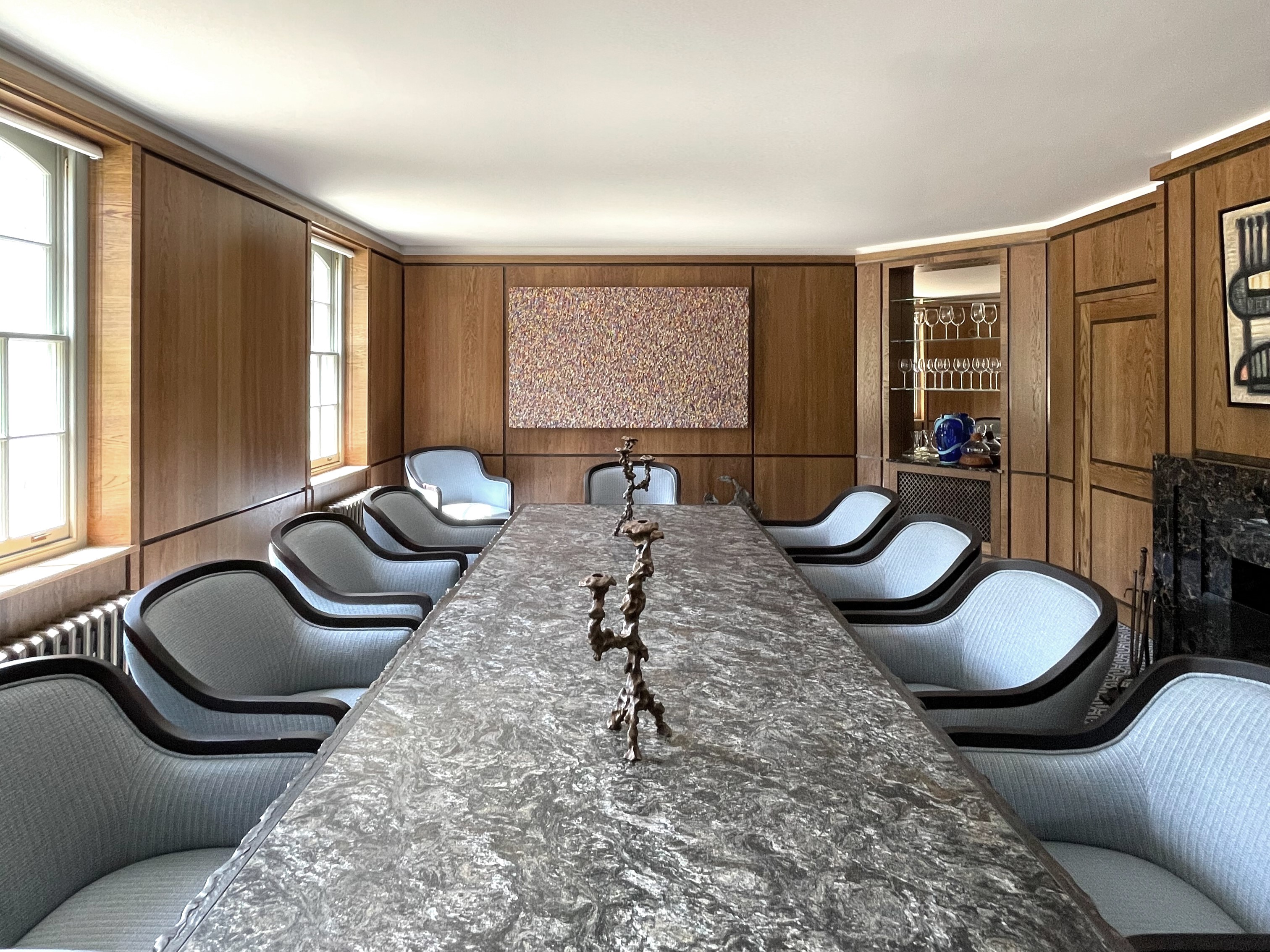 Formal dining room with artwork and fireplace