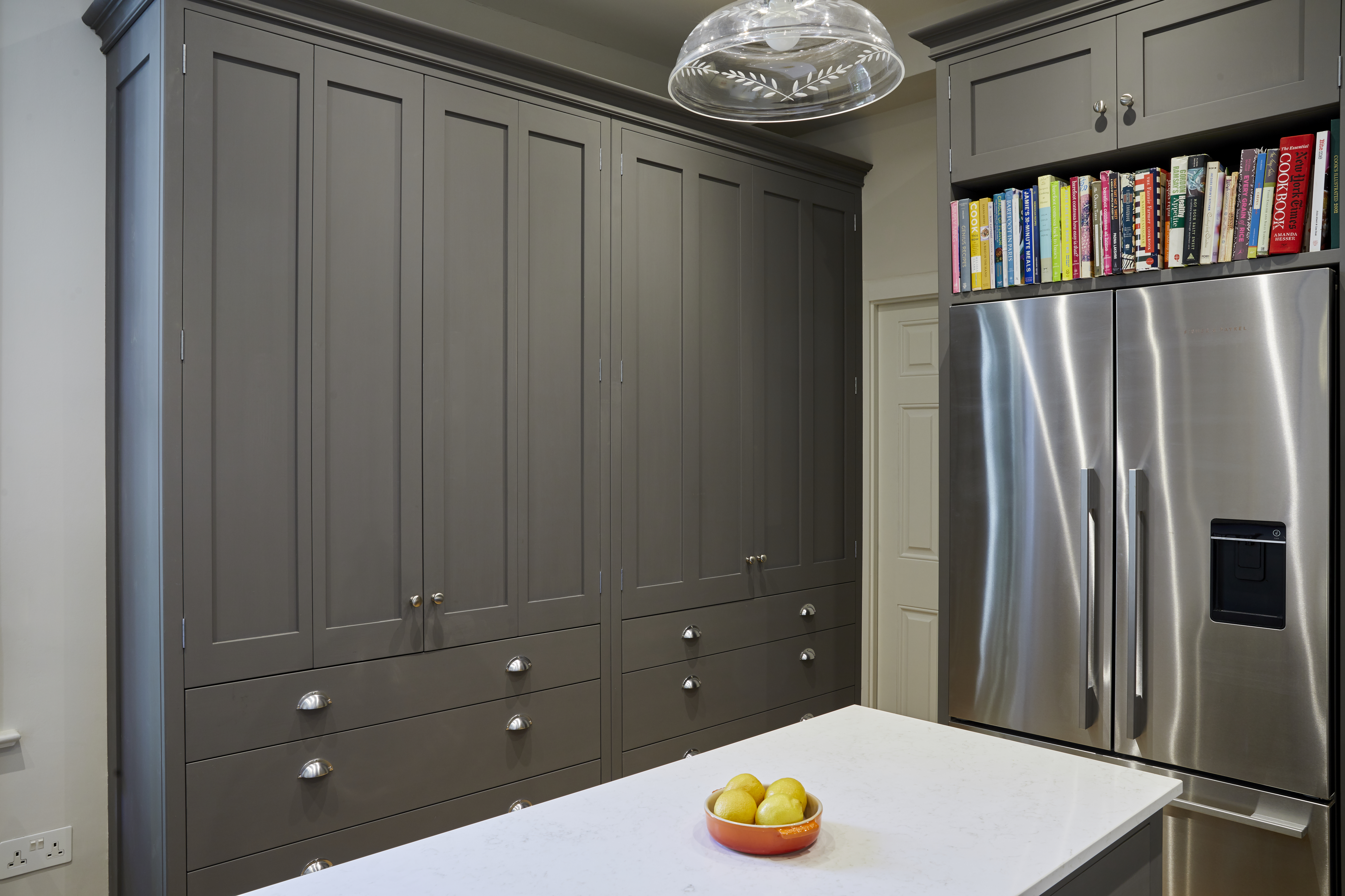 Bespoke kitchen with grey shaker cabinets made for West London client by Holland Street Kitchens.