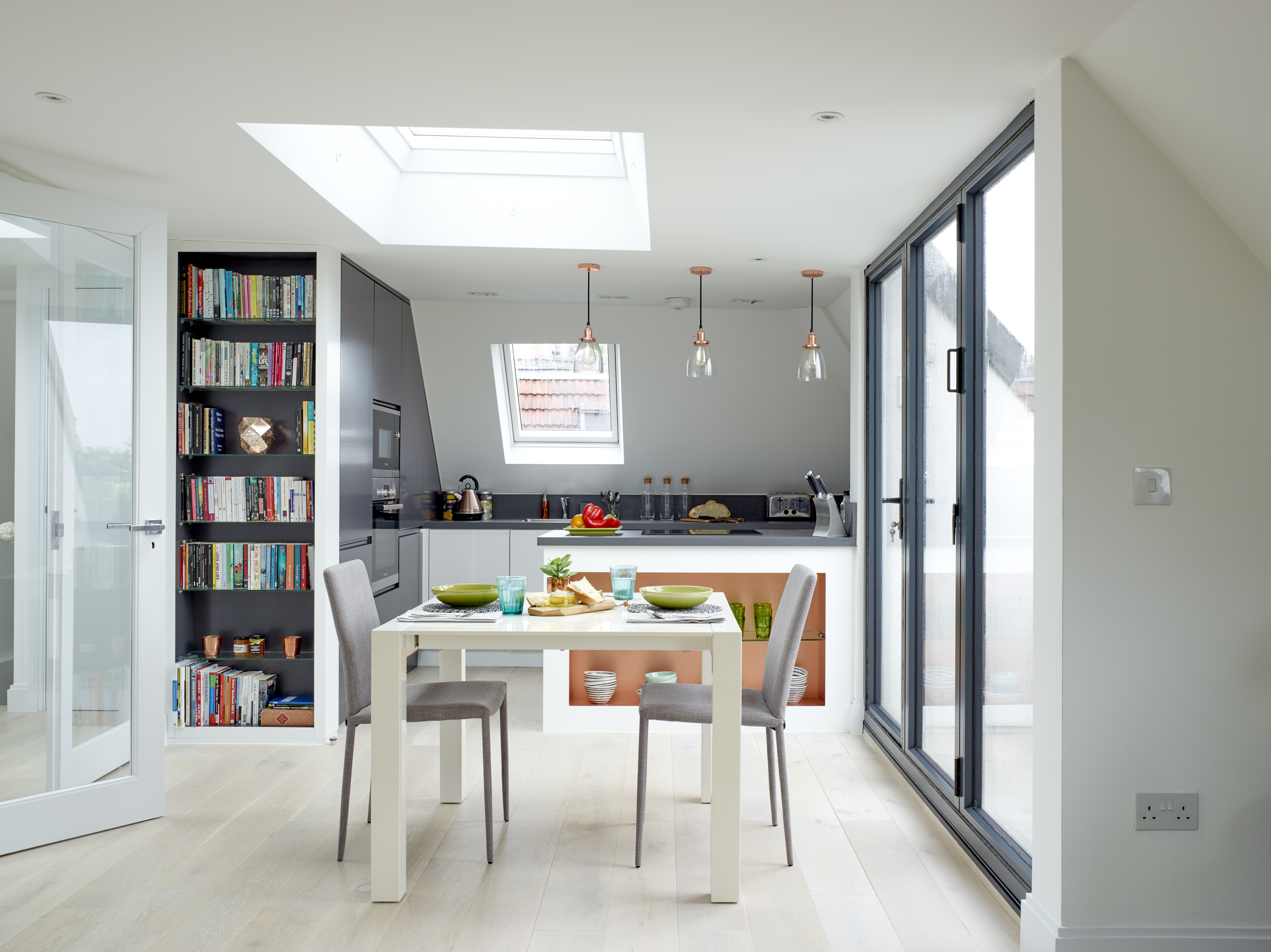 Kitchen and dining in a loft conversion, West Hampstead