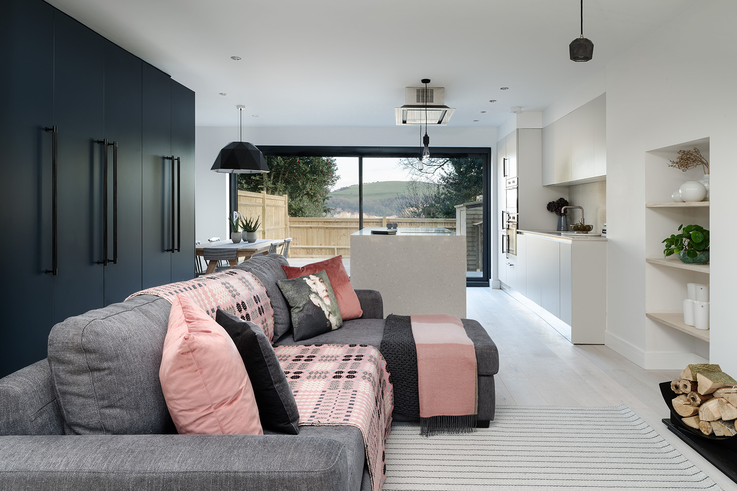 Living room; L-shaped sofa; grey sofa