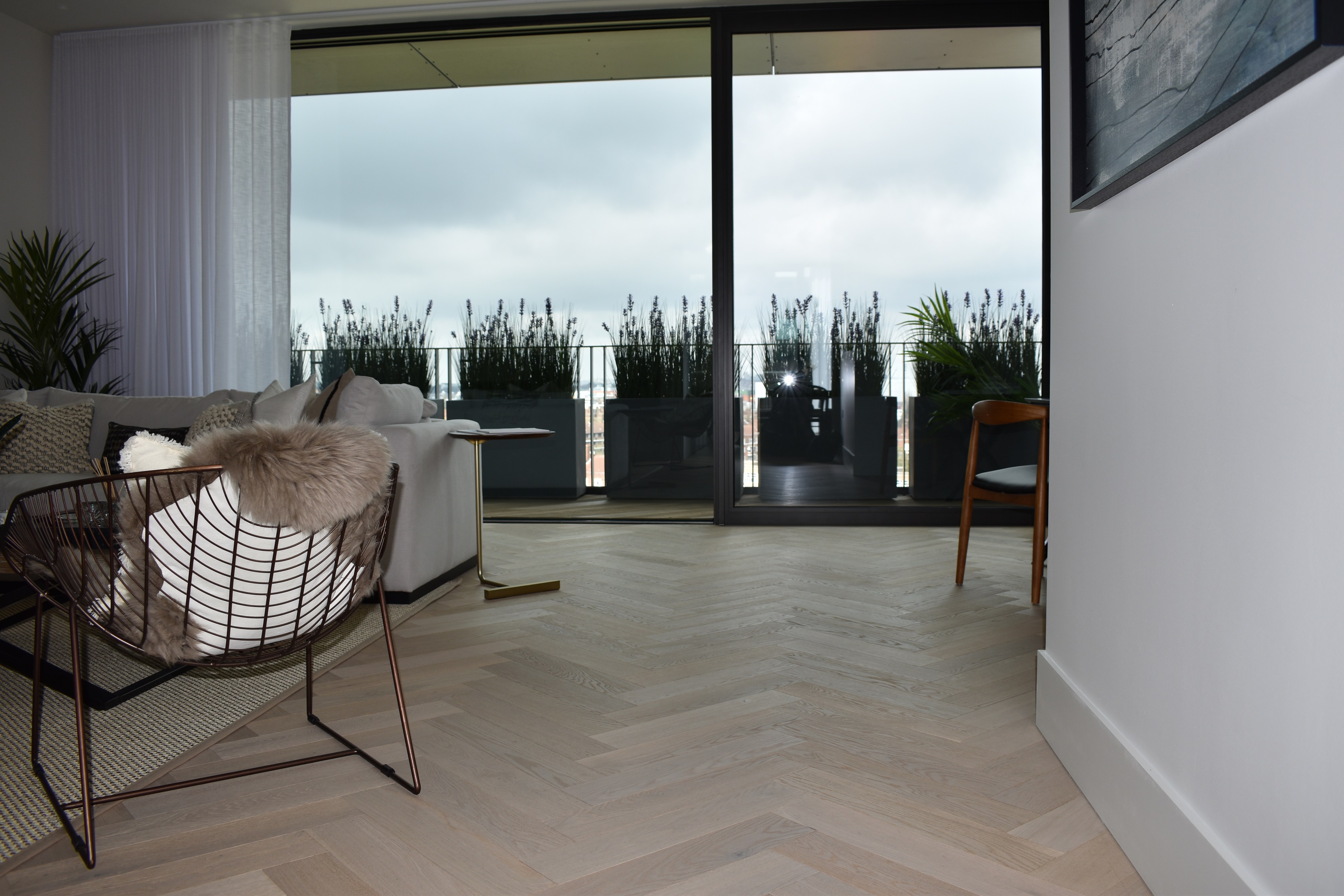 White UV Oiled herringbone parquet flooring in the BBC apartments TW E942